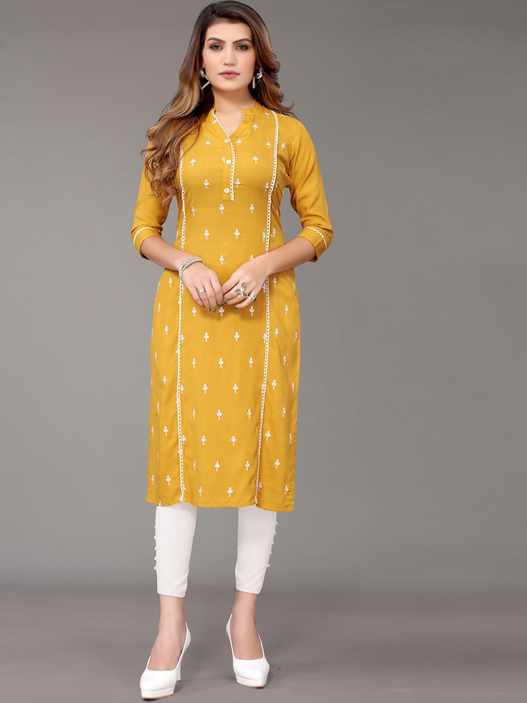 

Nimayaa Women Mustard Yellow Floral Embroidered Thread Work White Kurta