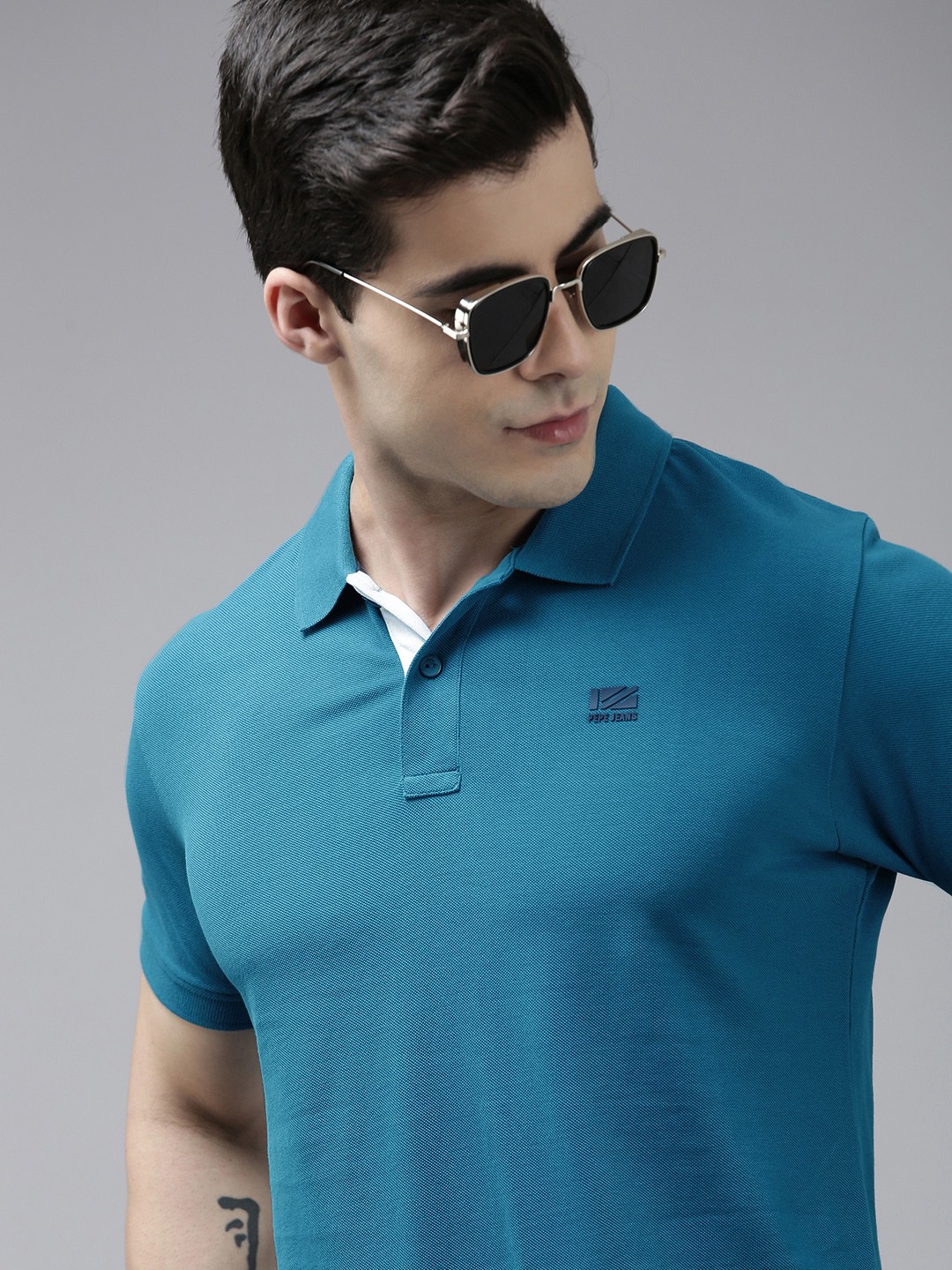 

Pepe Jeans Men Solid Polo Collar Indigo Knitted Pure Cotton T-shirt, Teal
