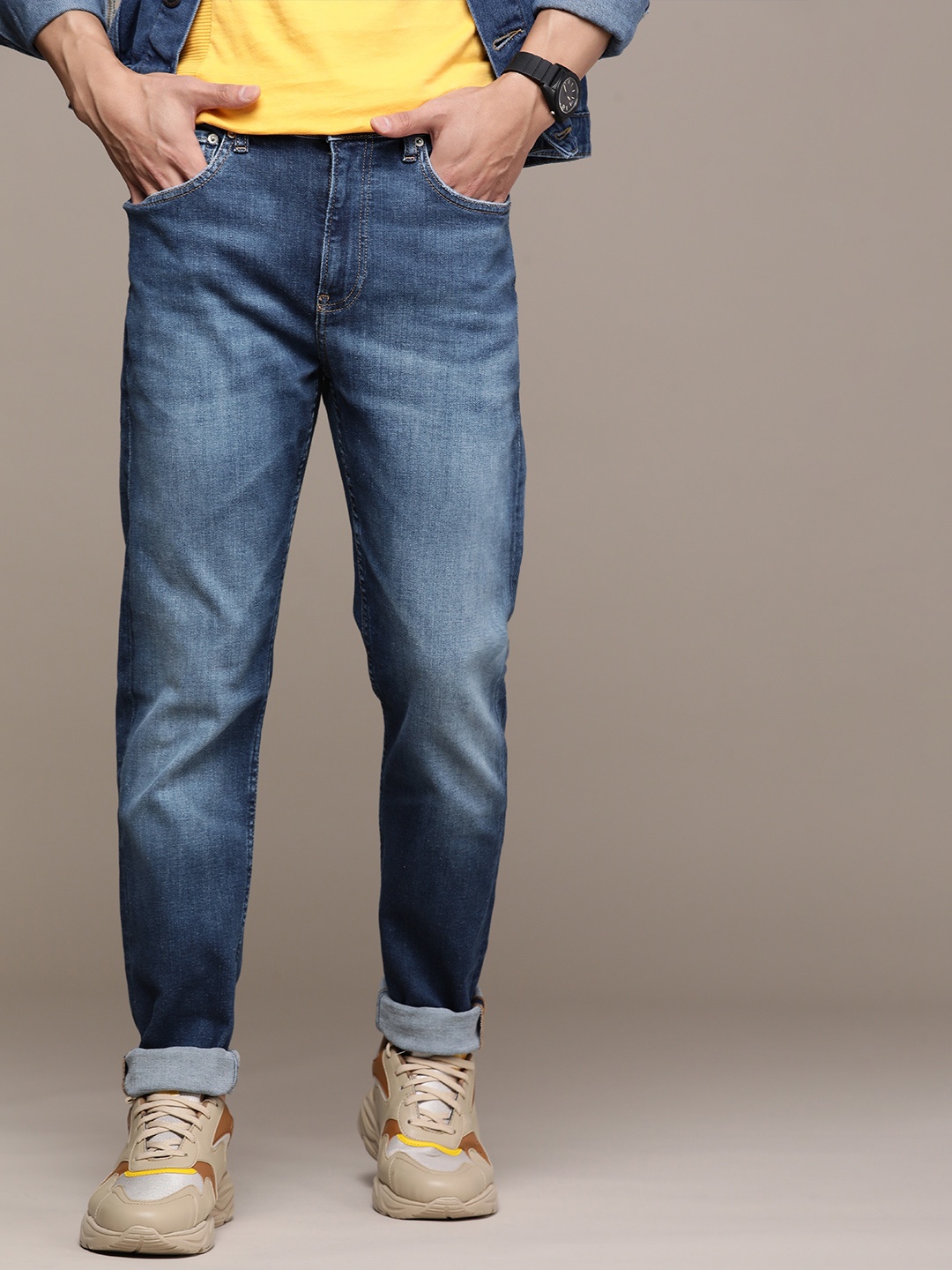 

Calvin Klein Jeans Men Slim Tapered Fit Heavy Fade Stretchable Jeans, Blue