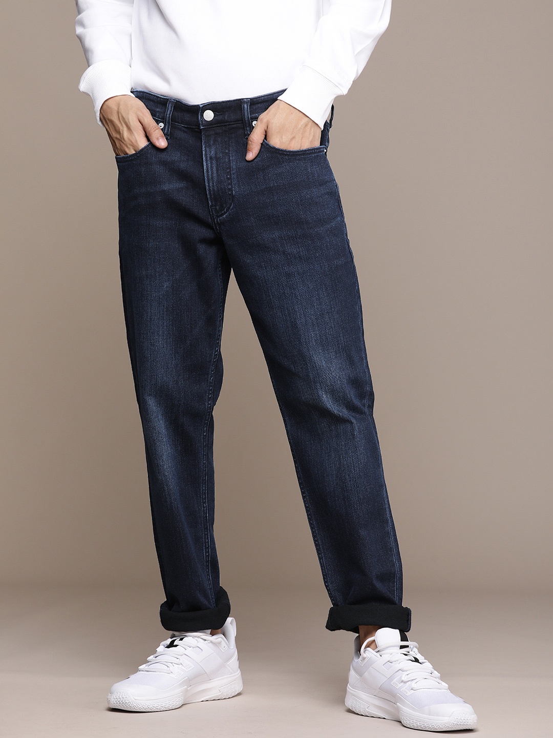 

Calvin Klein Jeans Men Blue Tapered Fit Stretchable Jeans