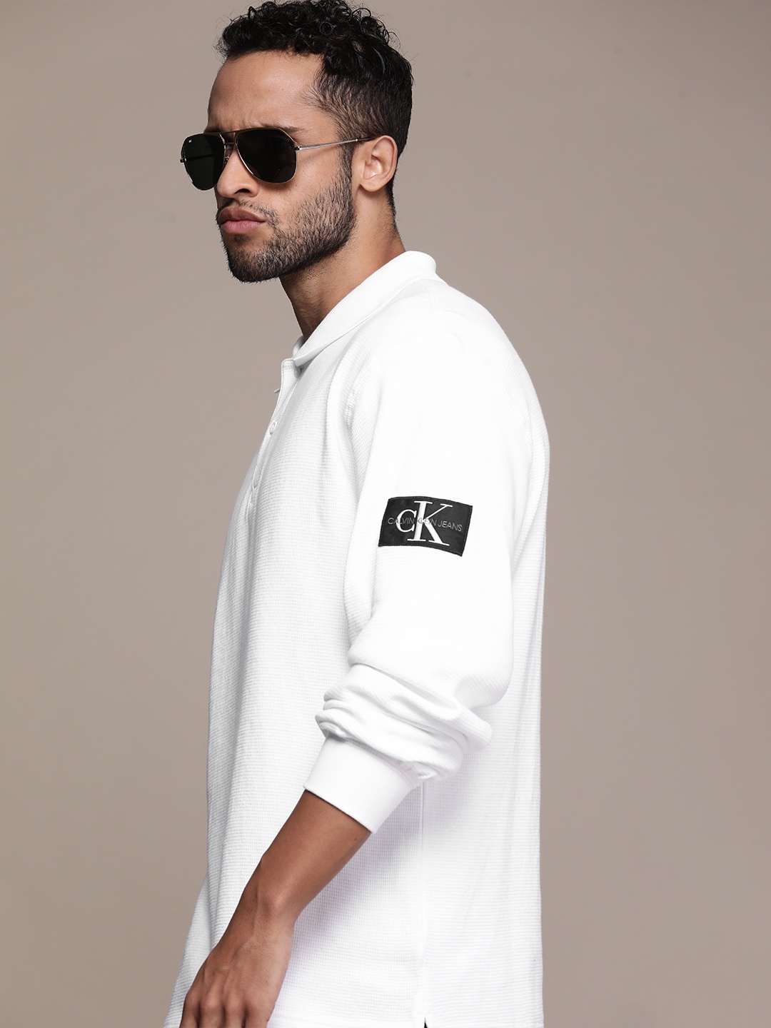 

Calvin Klein Jeans Men White Pure Cotton Polo Collar Solid T-shirt with Brand Logo Detail
