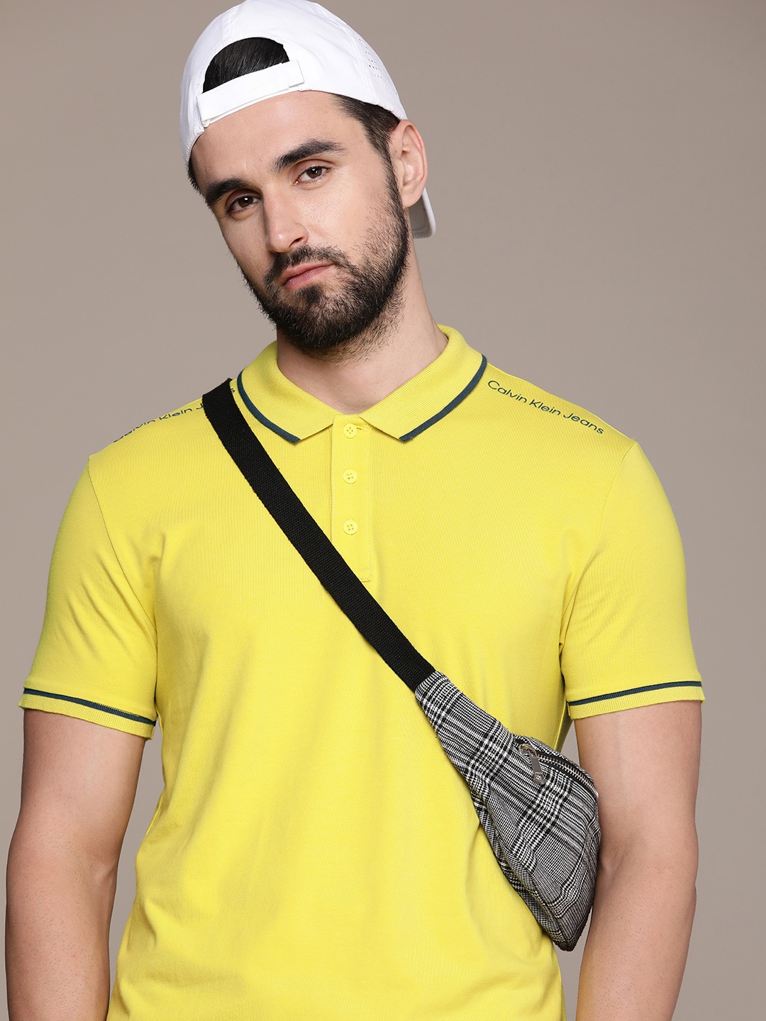 

Calvin Klein Jeans Men Yellow Brand Logo Polo Collar T-shirt