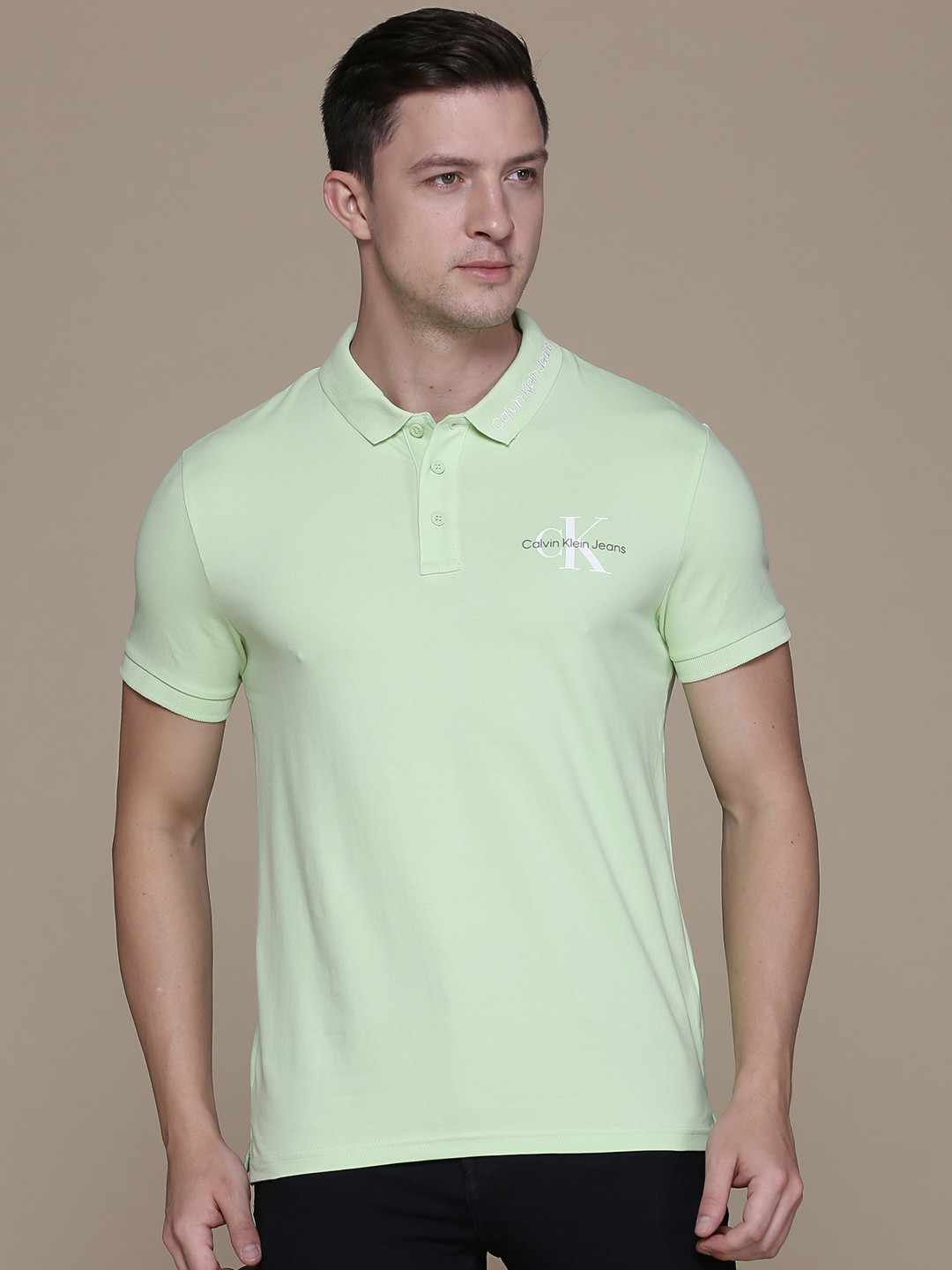 

Calvin Klein Jeans Men Neon Green Brand Logo Printed Polo Collar Slim Fit T-shirt