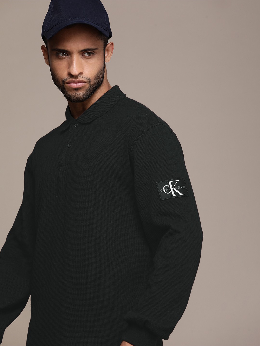 

Calvin Klein Jeans Men Black Solid Polo Collar Relaxed Fit Pure Cotton T-shirt