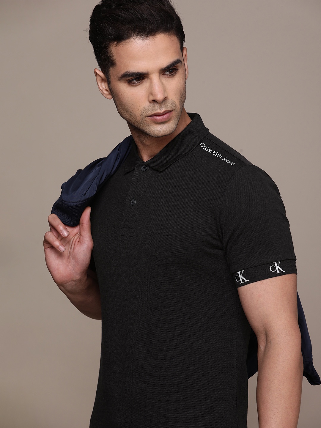 

Calvin Klein Jeans Men Black Polo Collar Slim Fit Solid T-shirt with Brand Logo Detail