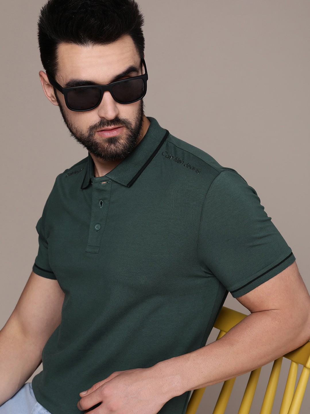 

Calvin Klein Jeans Men Teal Green Brand Logo Polo Collar T-shirt