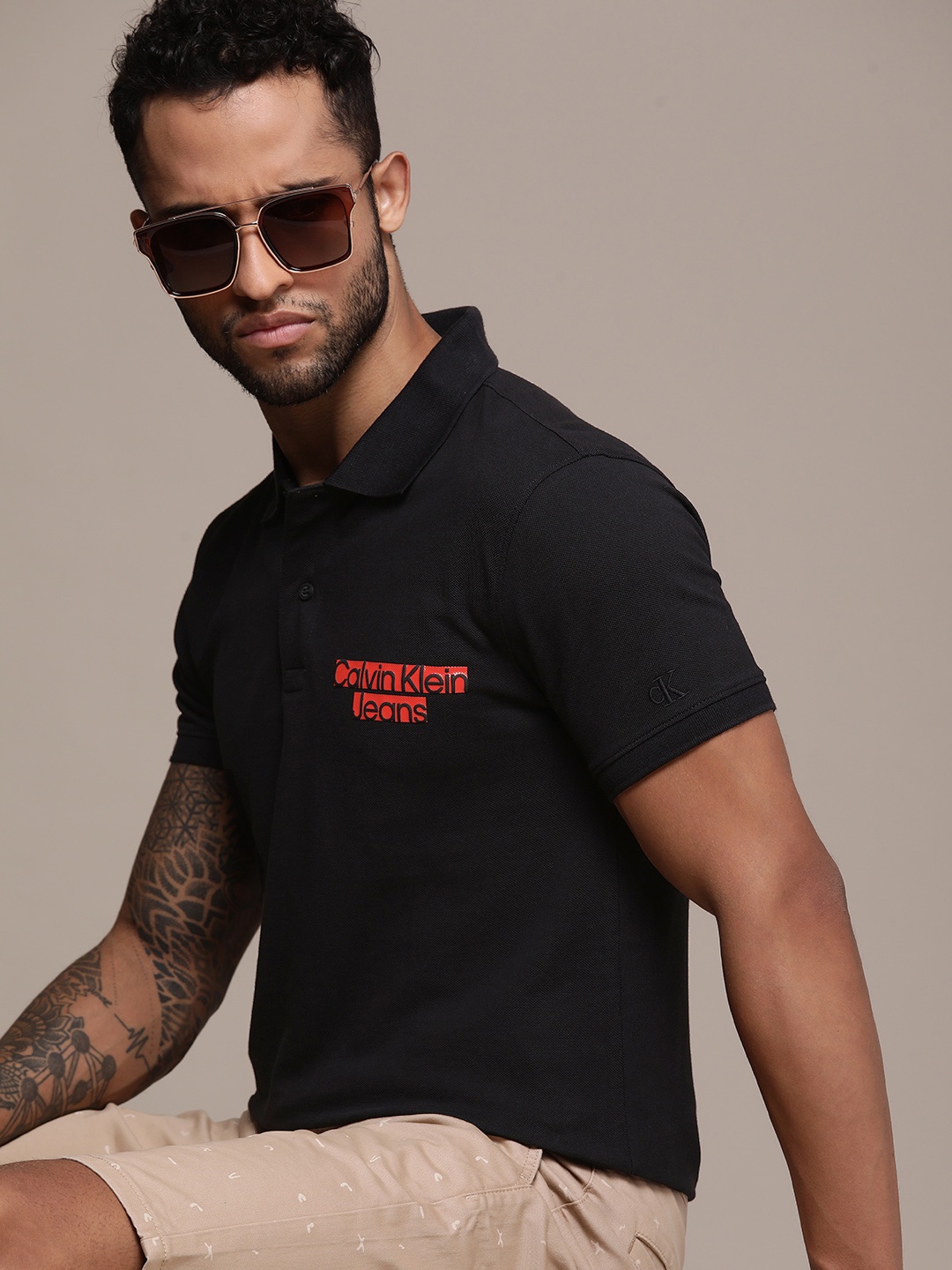 

Calvin Klein Jeans Men Black Brand Logo Placement Print Polo Collar Pure Cotton T-shirt