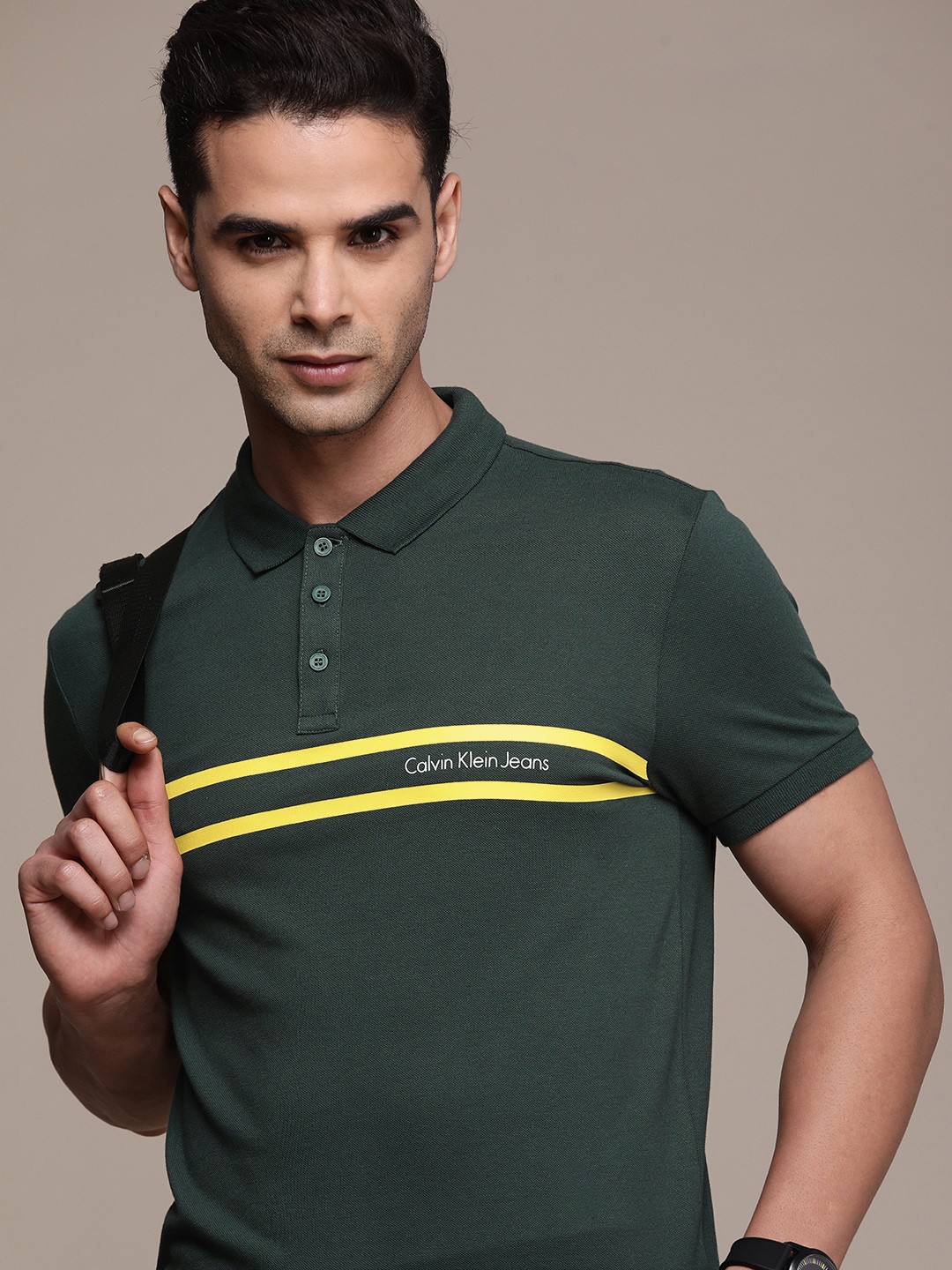 

Calvin Klein Jeans Men Teal Green Striped Polo Collar Slim Fit T-shirt
