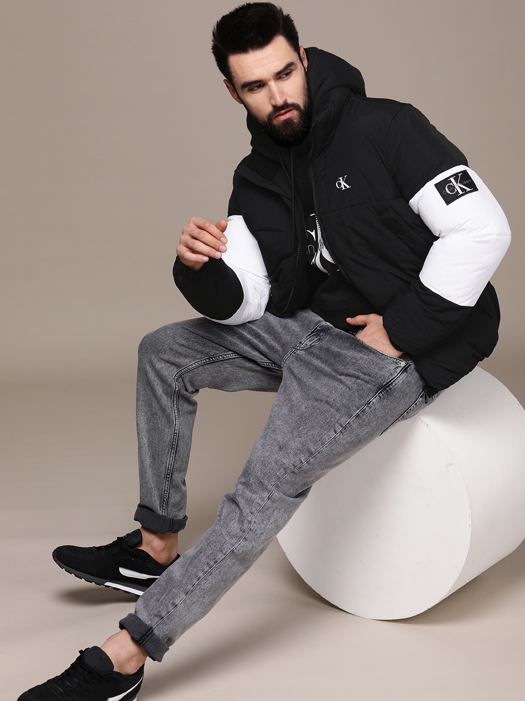 

Calvin Klein Jeans Men Black Brand Logo printed Puffer Jacket
