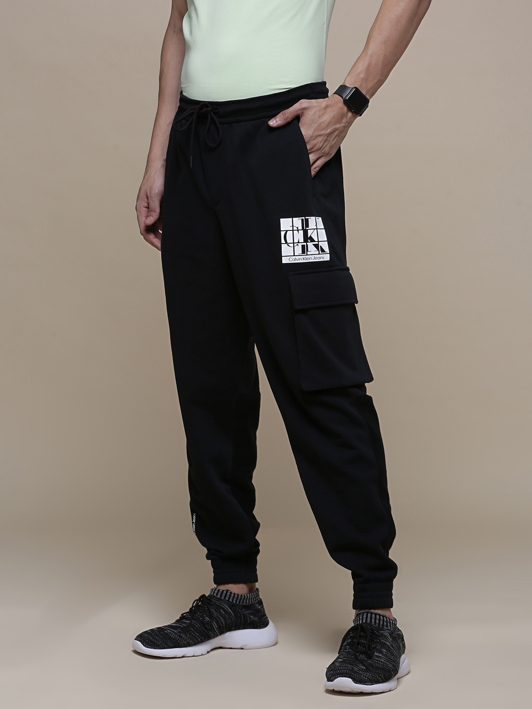 

Calvin Klein Jeans Men Black Solid Regular Fit URBAN Mid-Rise Joggers