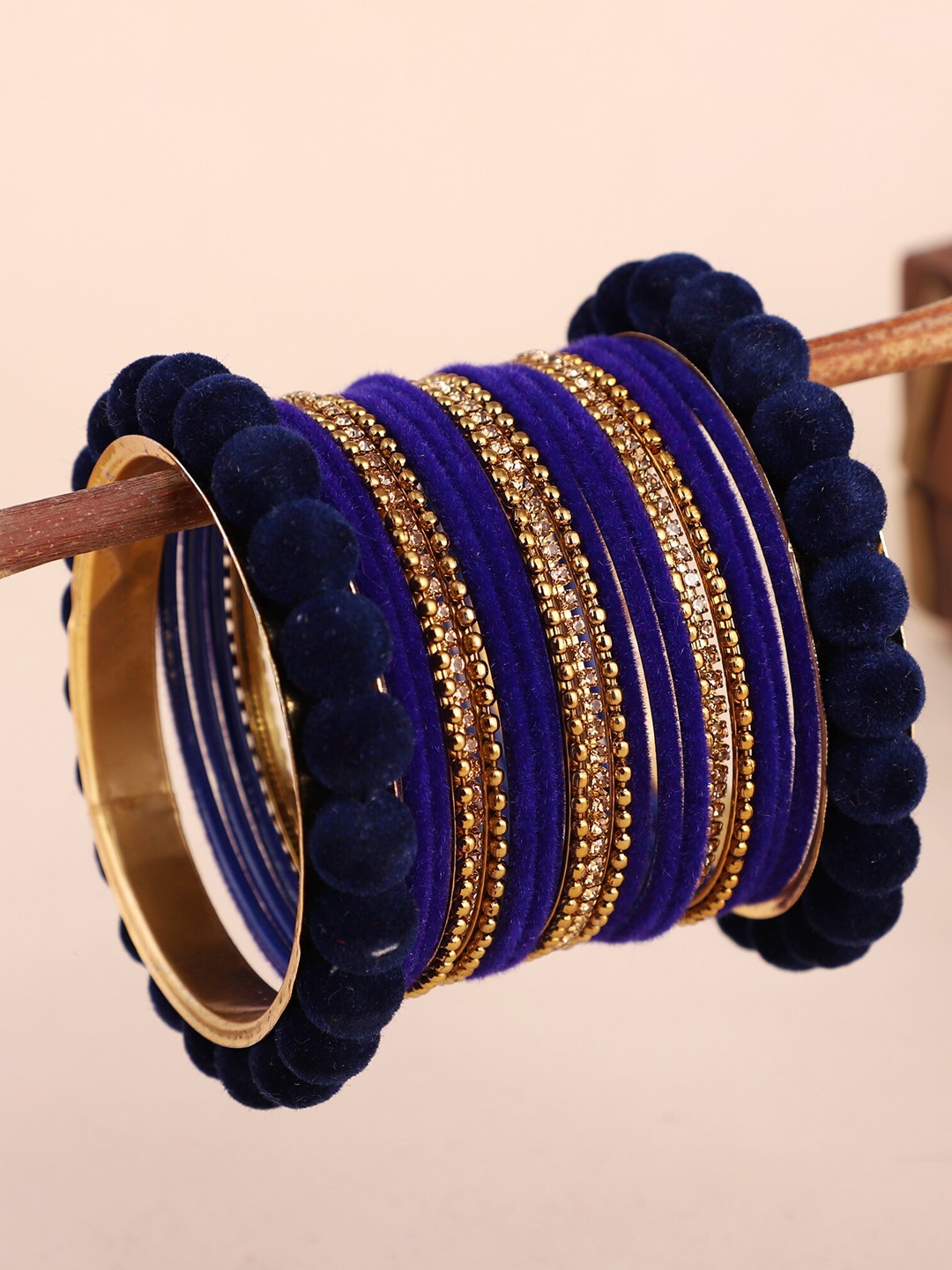 

ZaffreCollections Set Of 23 Navy Blue Velvet Coated & Stone Studded Metal Bangles