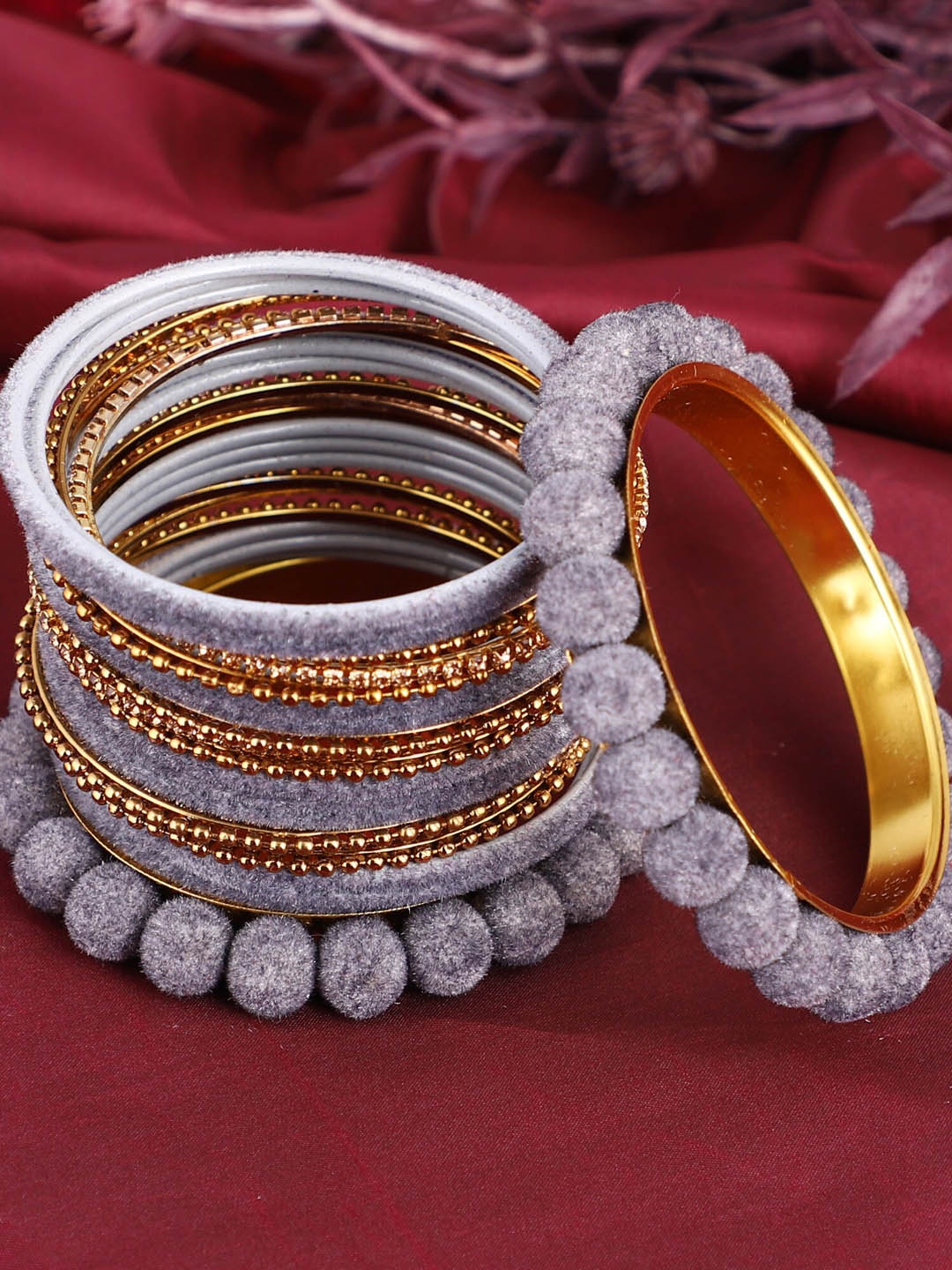 

ZaffreCollections Set Of 23 Gold-Plated Grey Velvet Coated & Stone Studded Metal Bangles