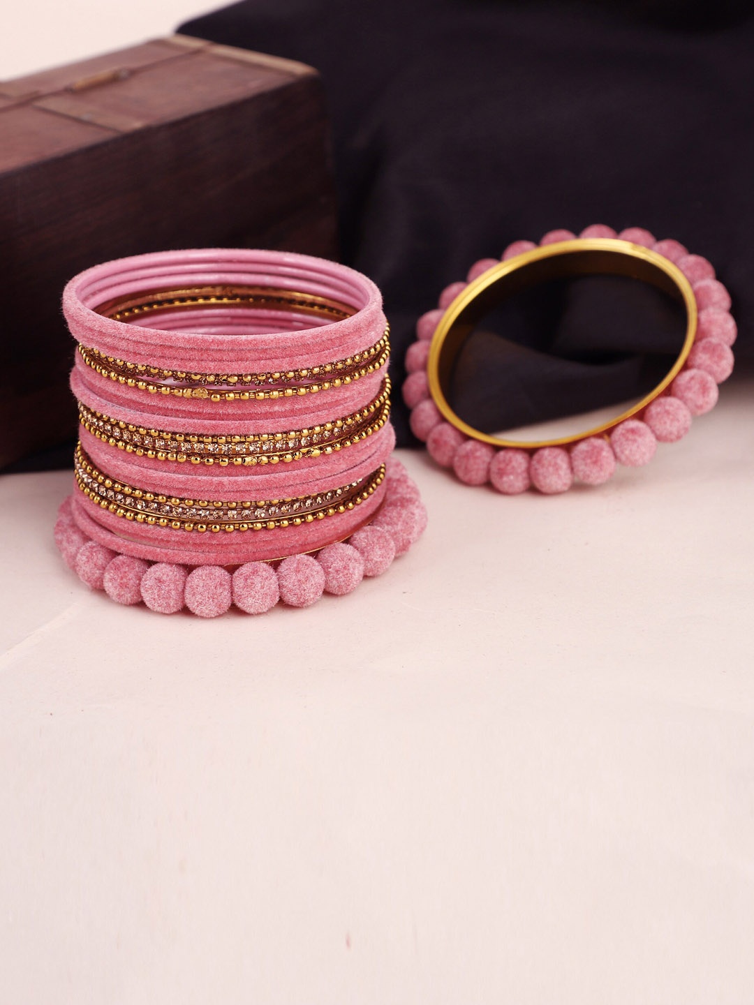 

ZaffreCollections Set Of 23 Gold-Plated Pink Velvet Coated Metal Bangles