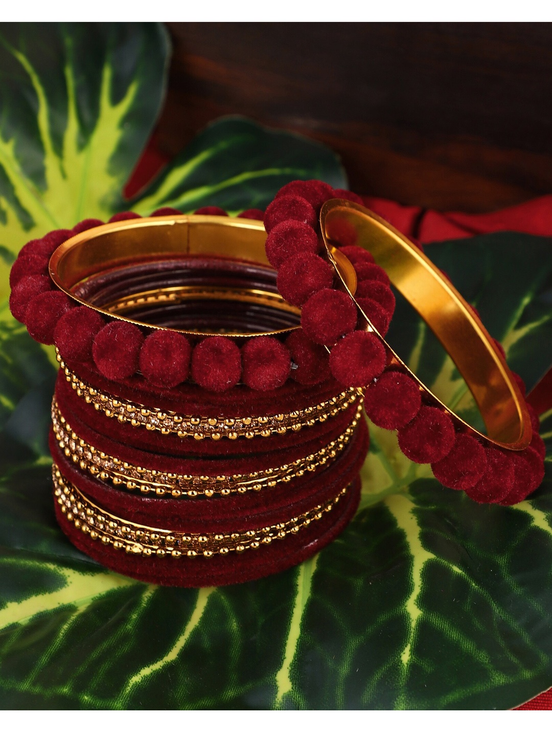 

ZaffreCollections Set Of 23 Maroon Gold-Plated Velvet Coated & Stone Studded Metal Bangles