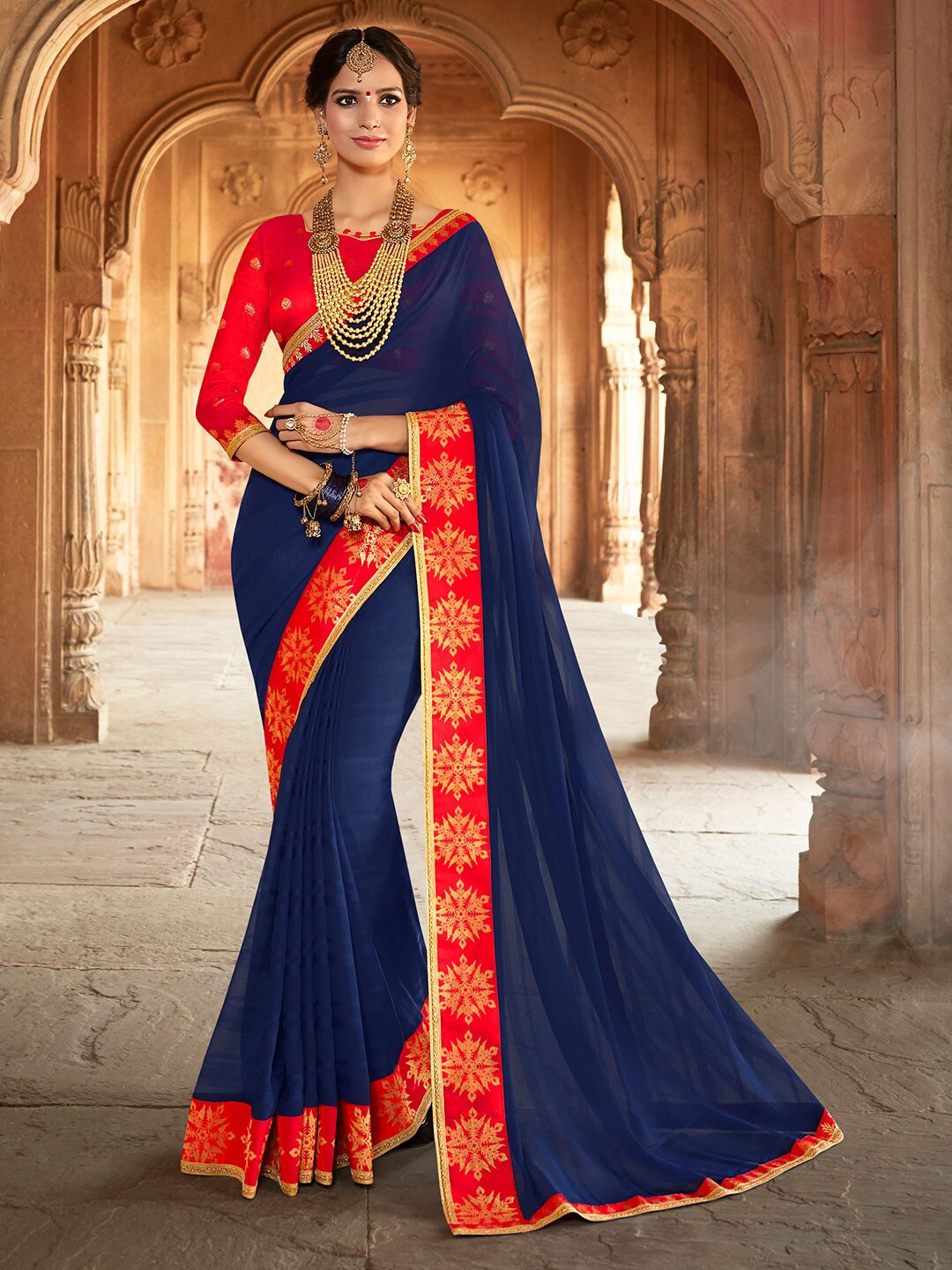 

Shaily Blue & Orange Zari Pure Chiffon Saree