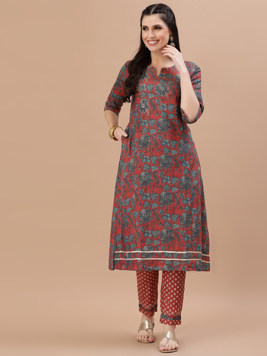 

Smiro Women Pink Floral Printed Sequinned Linen Kurta with Trousers