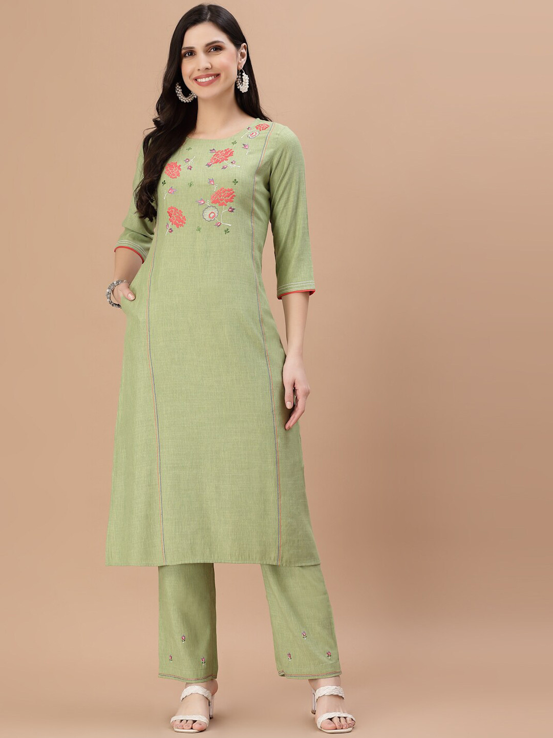 

Smiro Women Green Floral Embroidered Kurta with Trouser