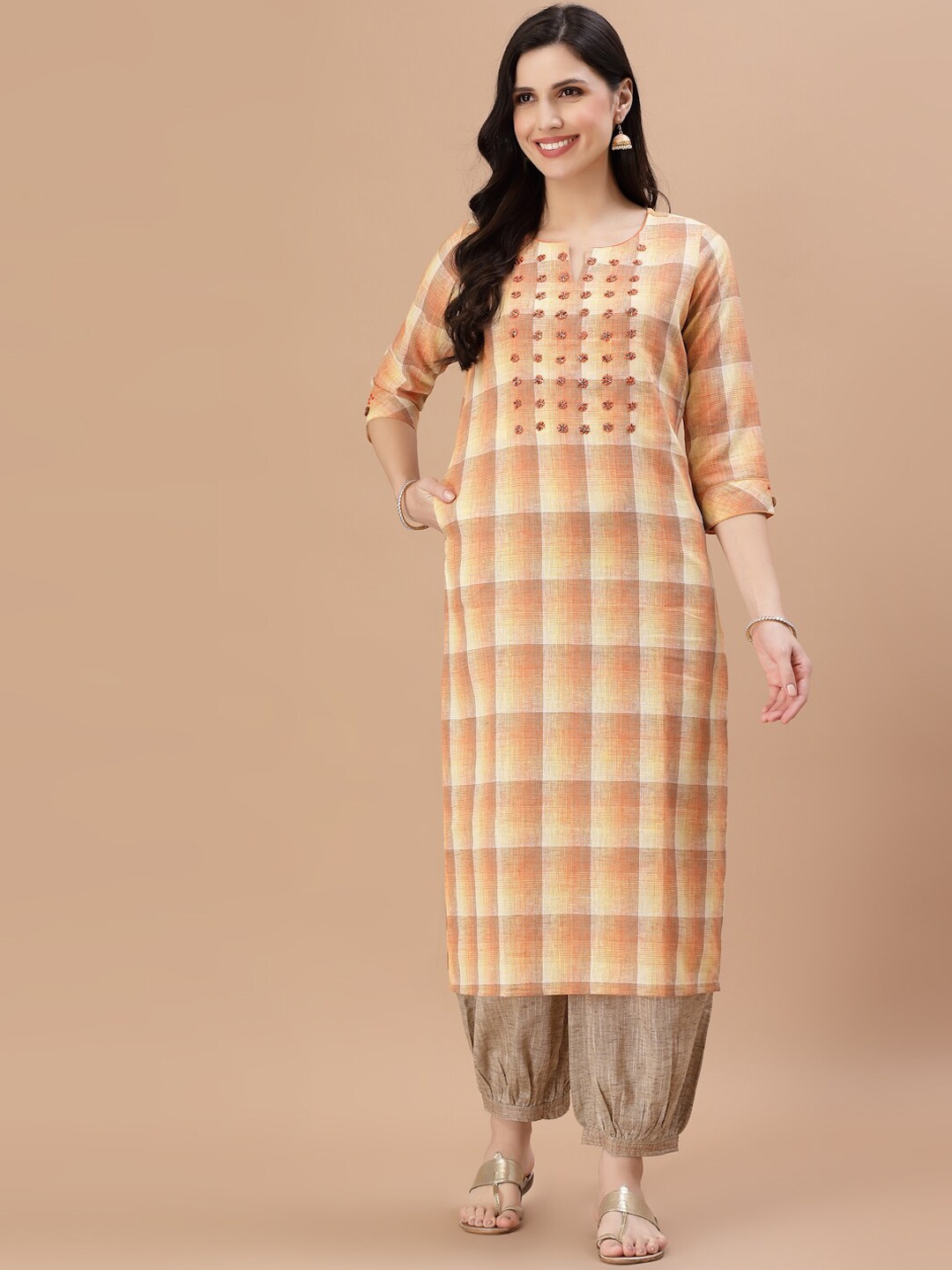 

Smiro Women Orange Thread Work Kurta with Salwar