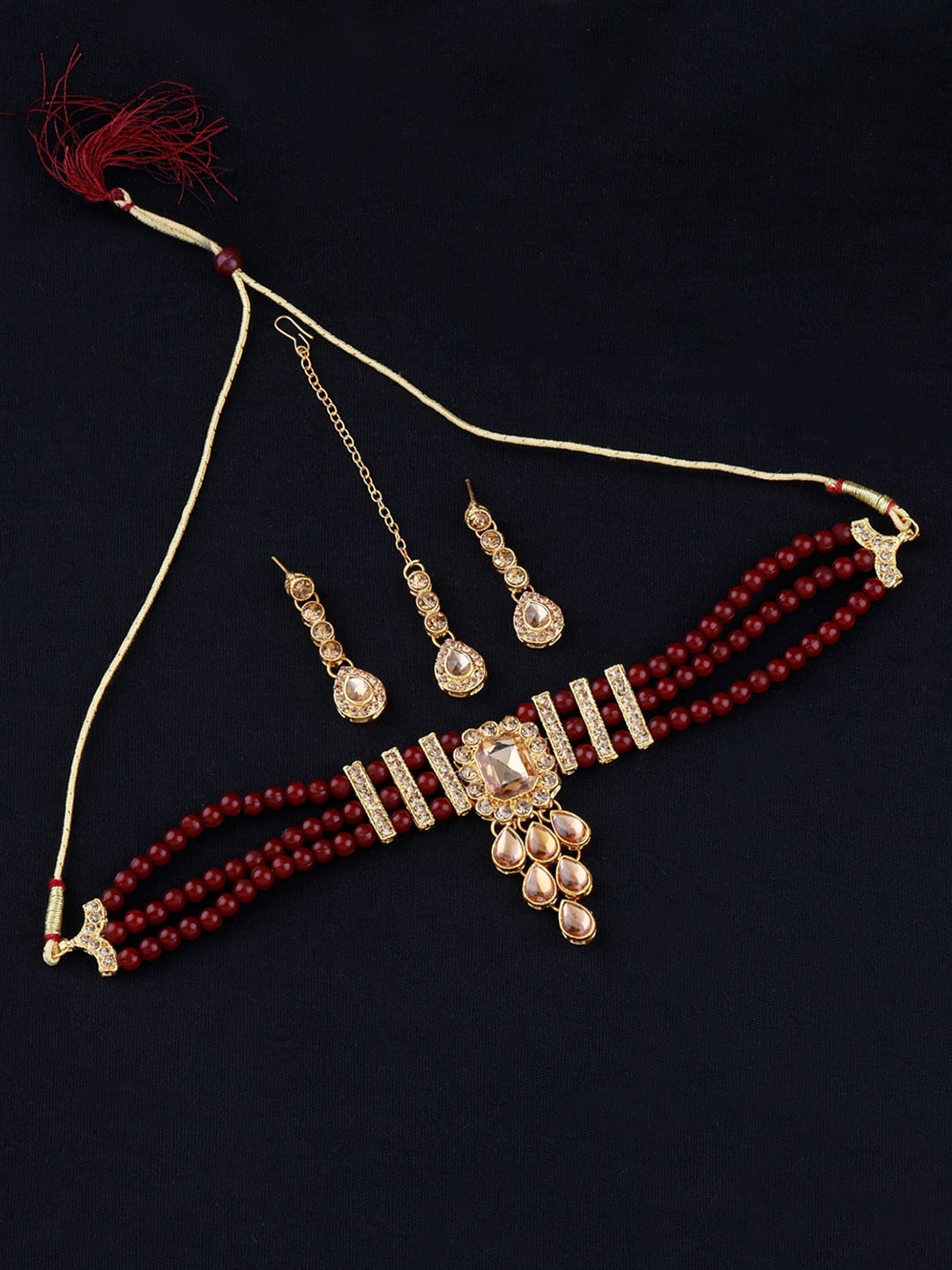 

Silver Shine Women Gold-Plated Red & White Stone-Studded & Beaded Jewellery Set