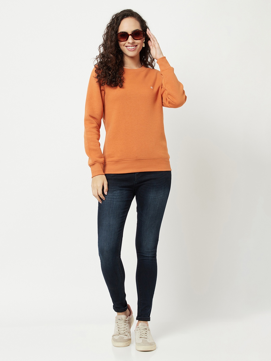 

Crimsoune Club Women Orange Solid Sweatshirt
