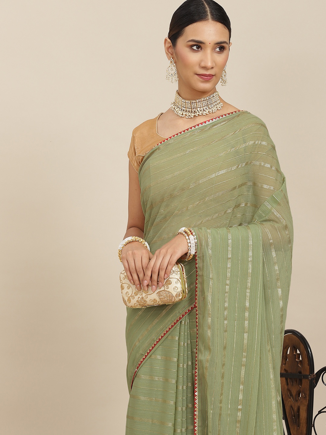 

Ishin Green Striped Gotta Patti Saree