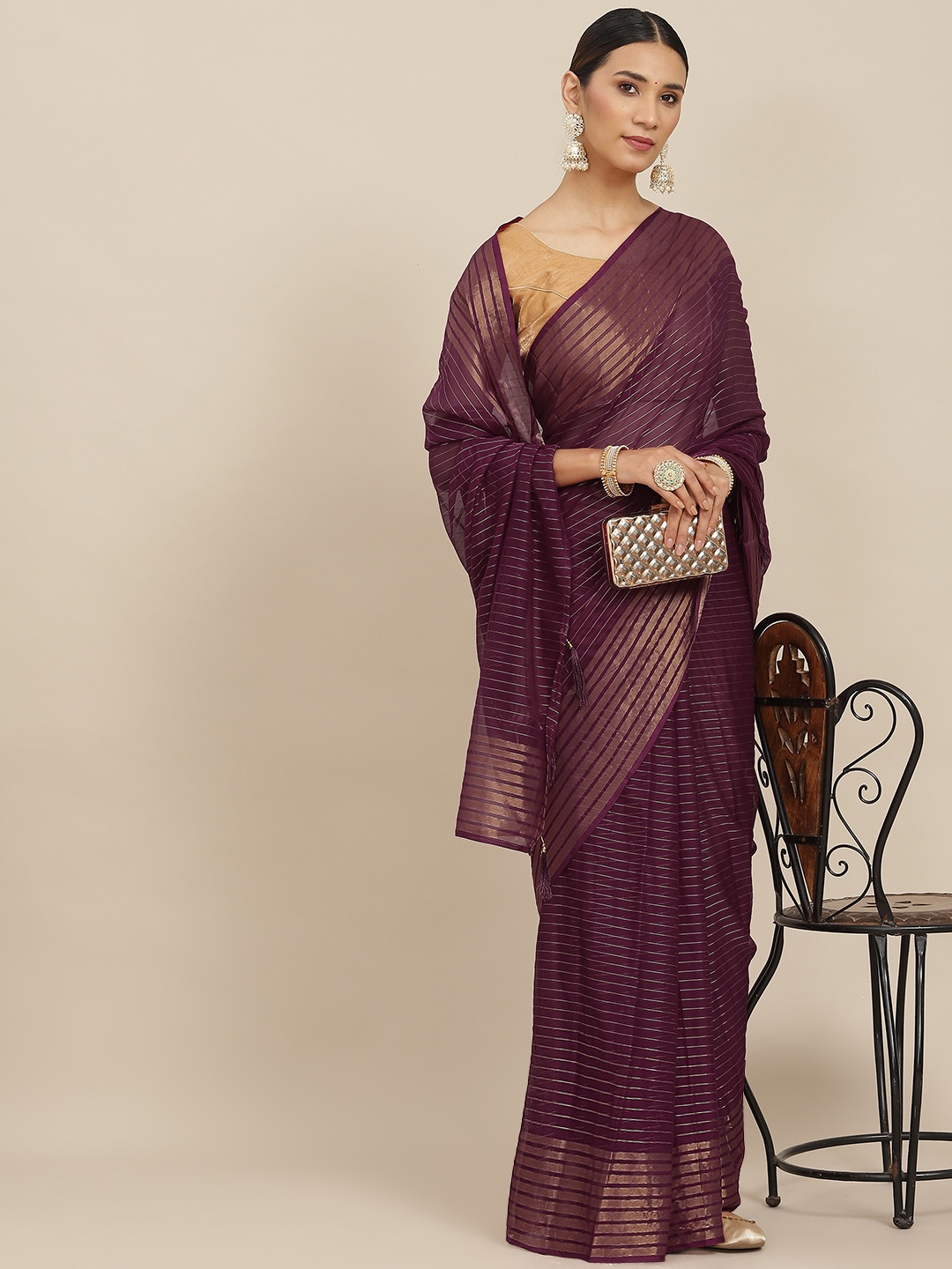 

Ishin Purple Striped Zari Saree