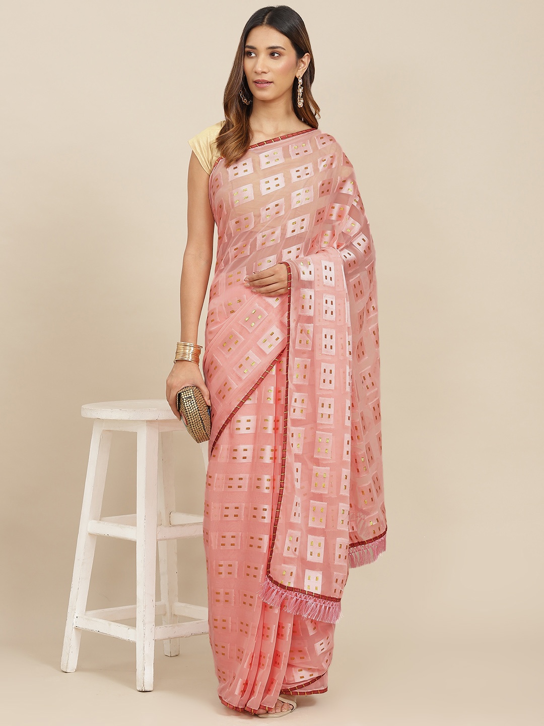 

Ishin Peach-Coloured & Golden Ethnic Design Zari Saree