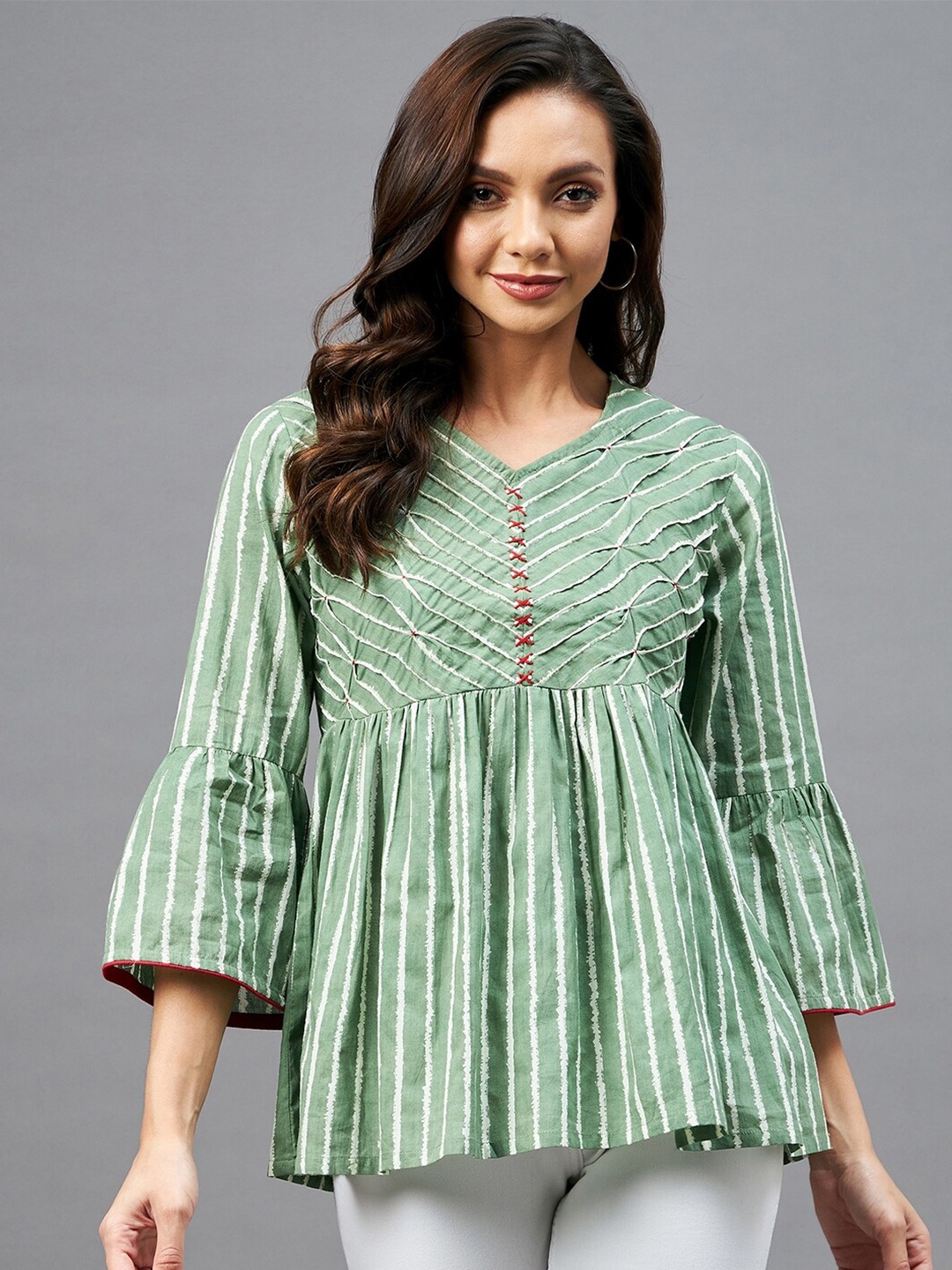 

Azira Women Green Striped Empire Top
