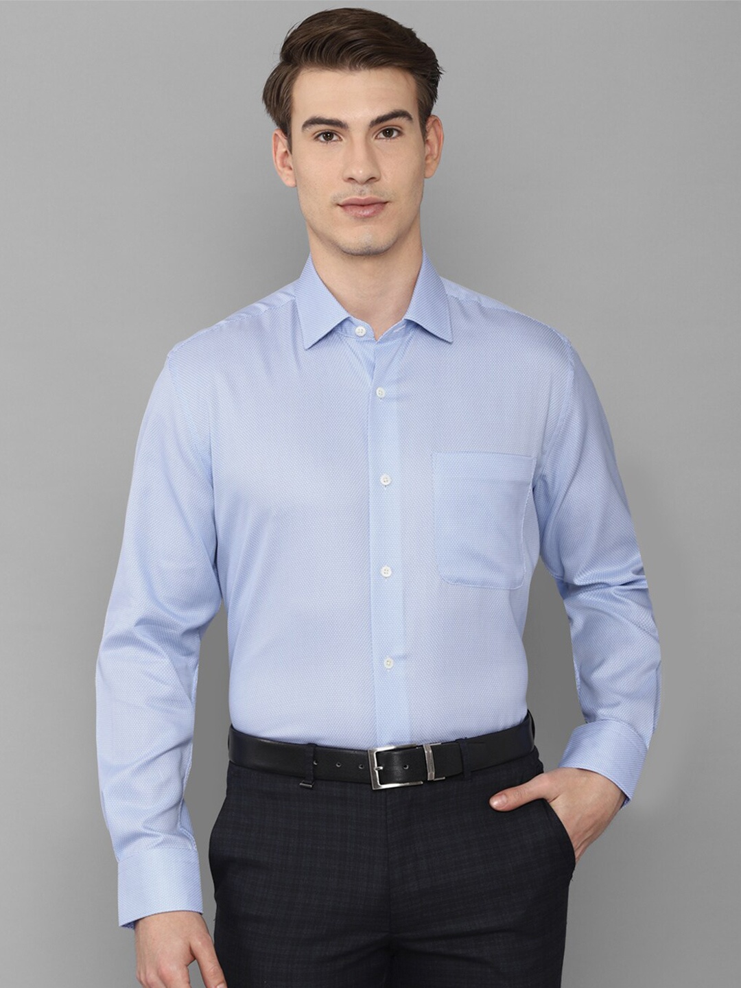 

Luxure by Louis Philippe Men Blue Solid Formal Shirt