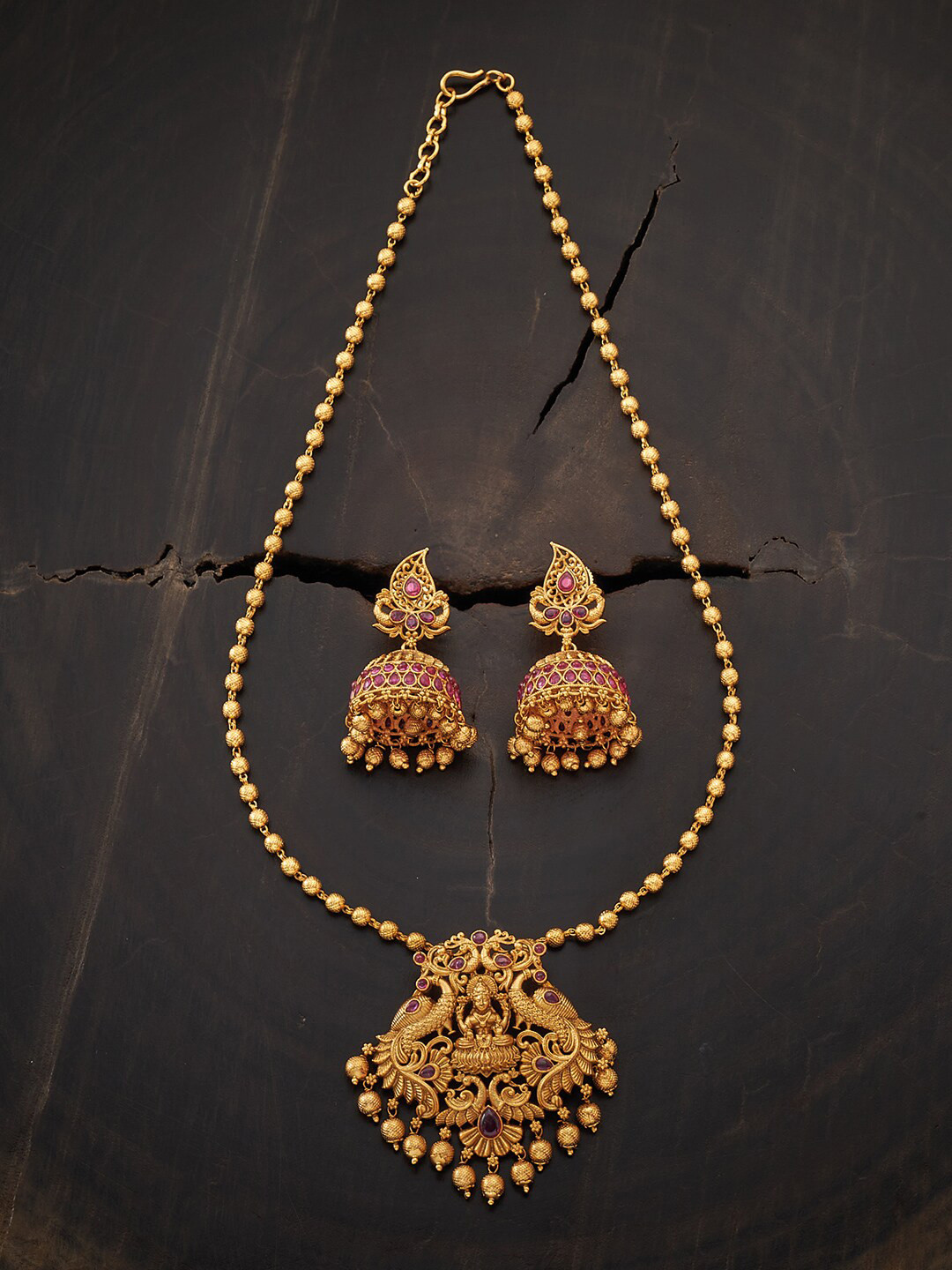 

Kushal's Fashion Jewellery Gold-Plated Pink Stone Studded & Beaded Antique Jewellery Set