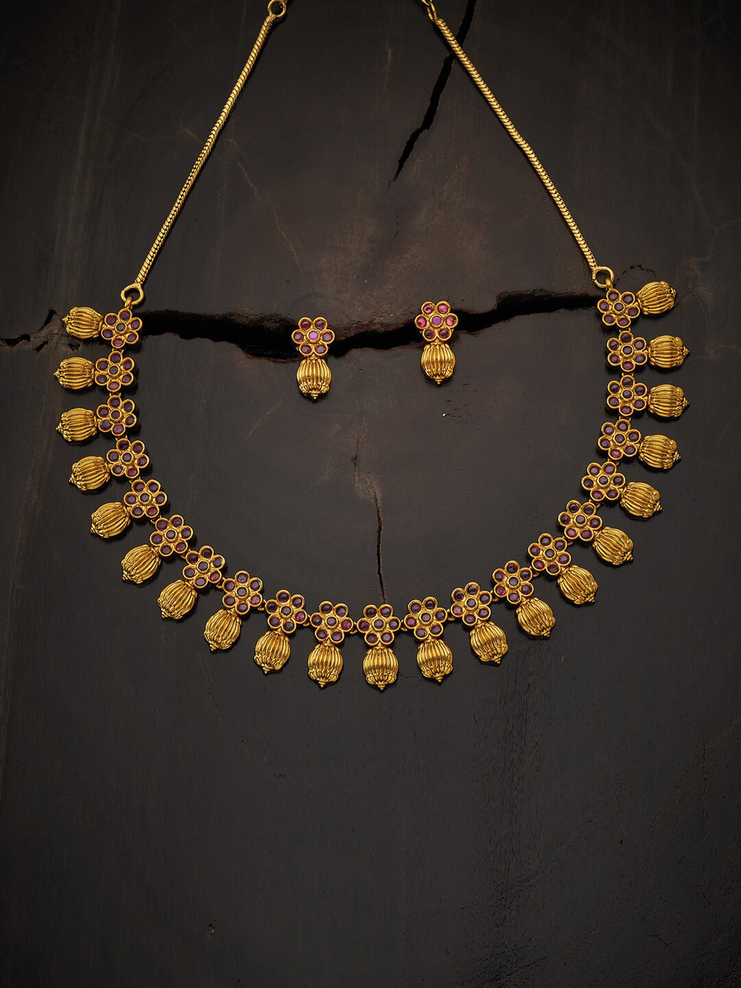 

Kushal's Fashion Jewellery Gold-Toned Pink Stone-Studded Antique Jewellery Set