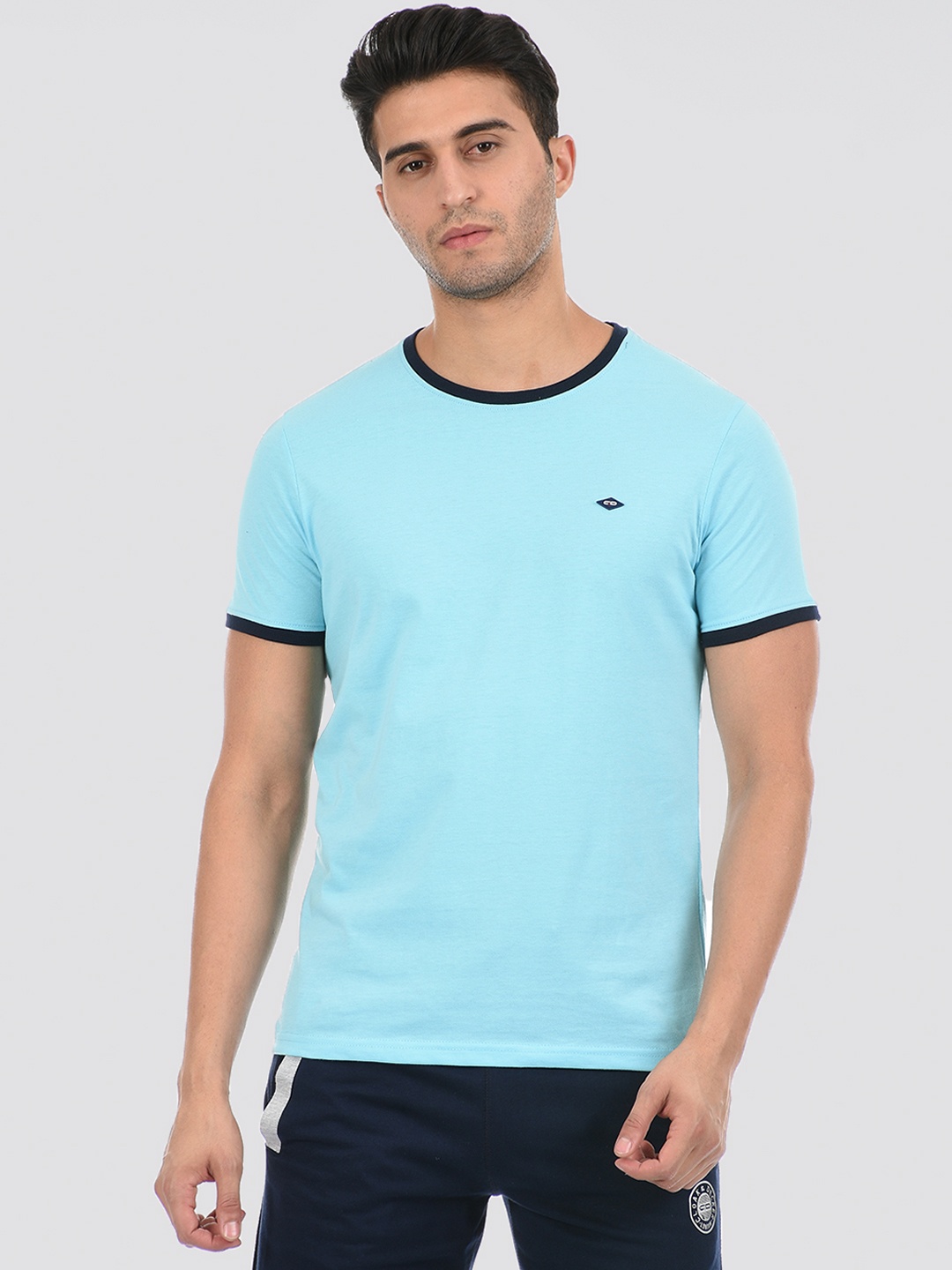 

Cloak & Decker by Monte Carlo Men Blue Solid T-shirt