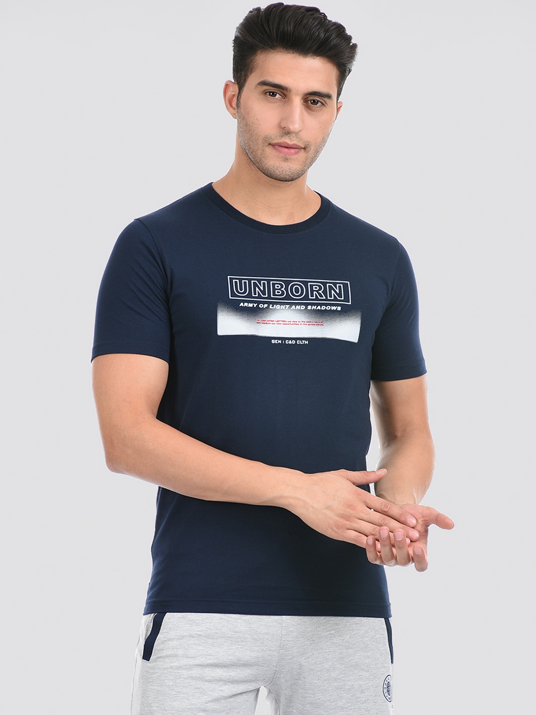 

Cloak & Decker by Monte Carlo Men Blue & Beige Typography Printed T-shirt
