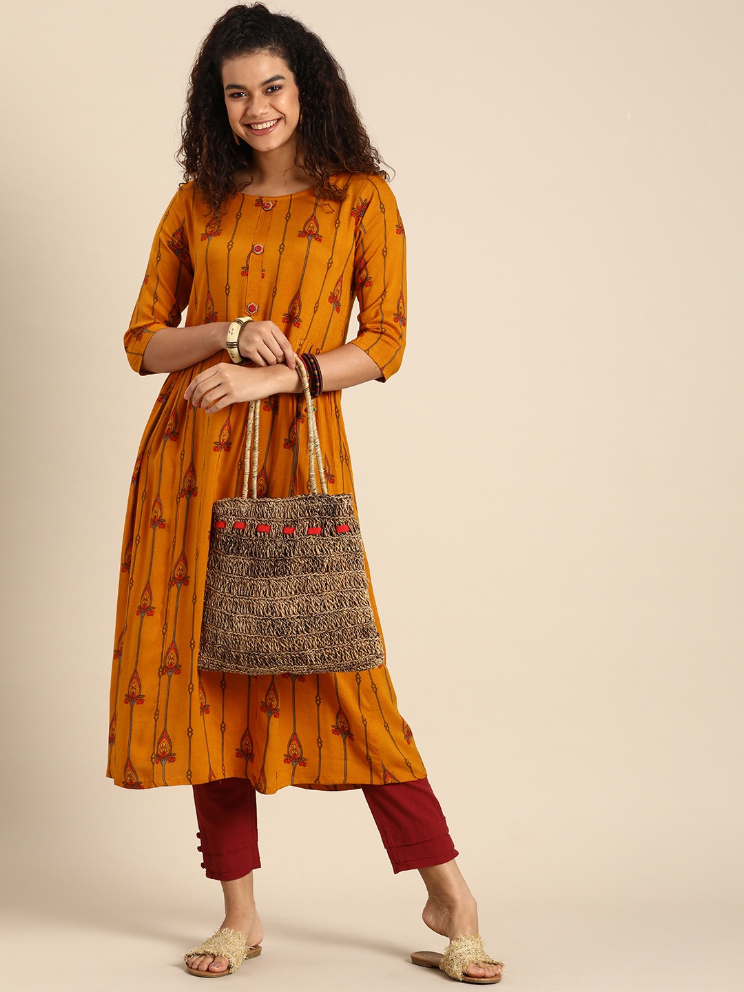 

Sangria Women Mustard Yellow & Red Ethnic Motifs Printed Kurta