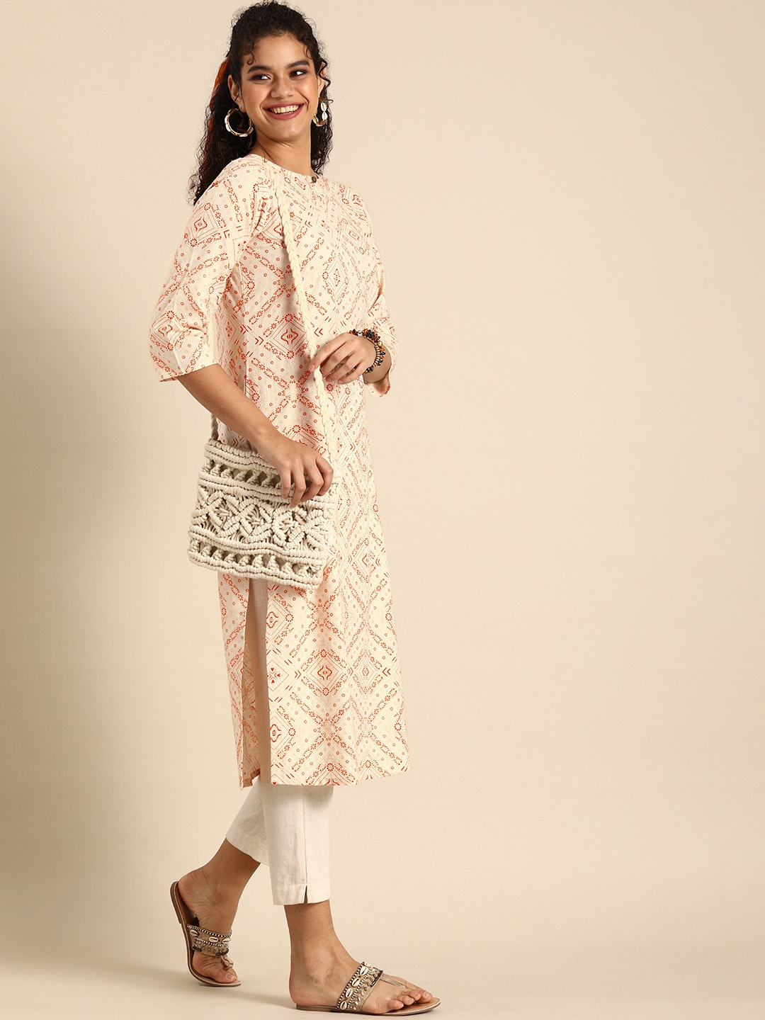 

Sangria Women Cream-Coloured & Orange Geometric Printed Keyhole Neck Kurta