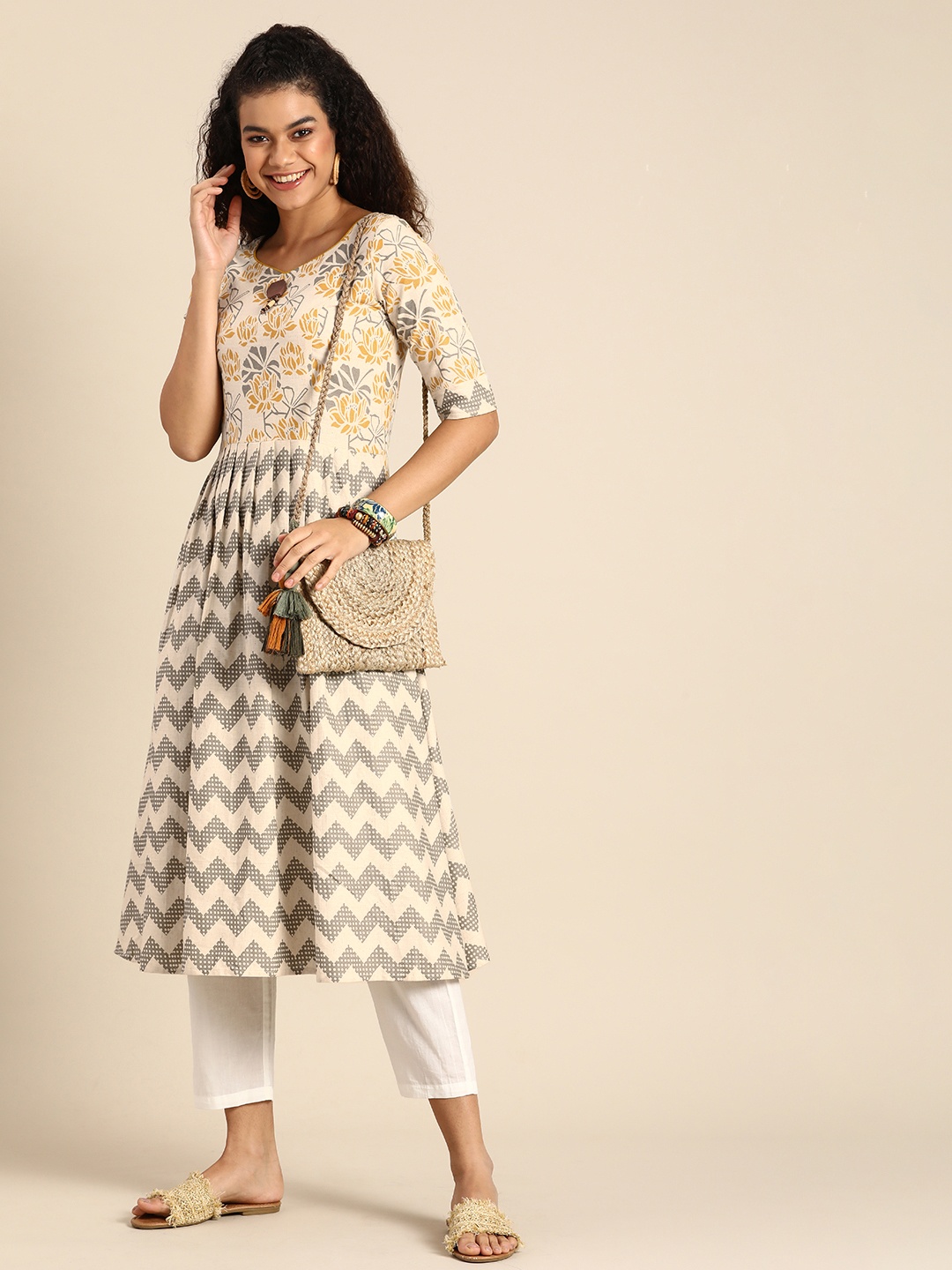 

Sangria Women Yellow & Grey Ethnic Motifs Printed Kurta