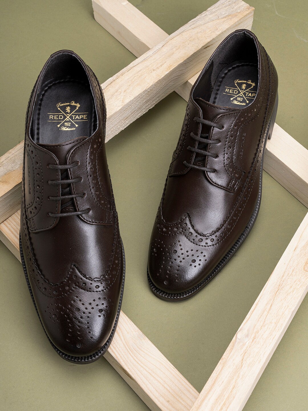 

Red Tape Men Brown Solid Formal Leather Borgues
