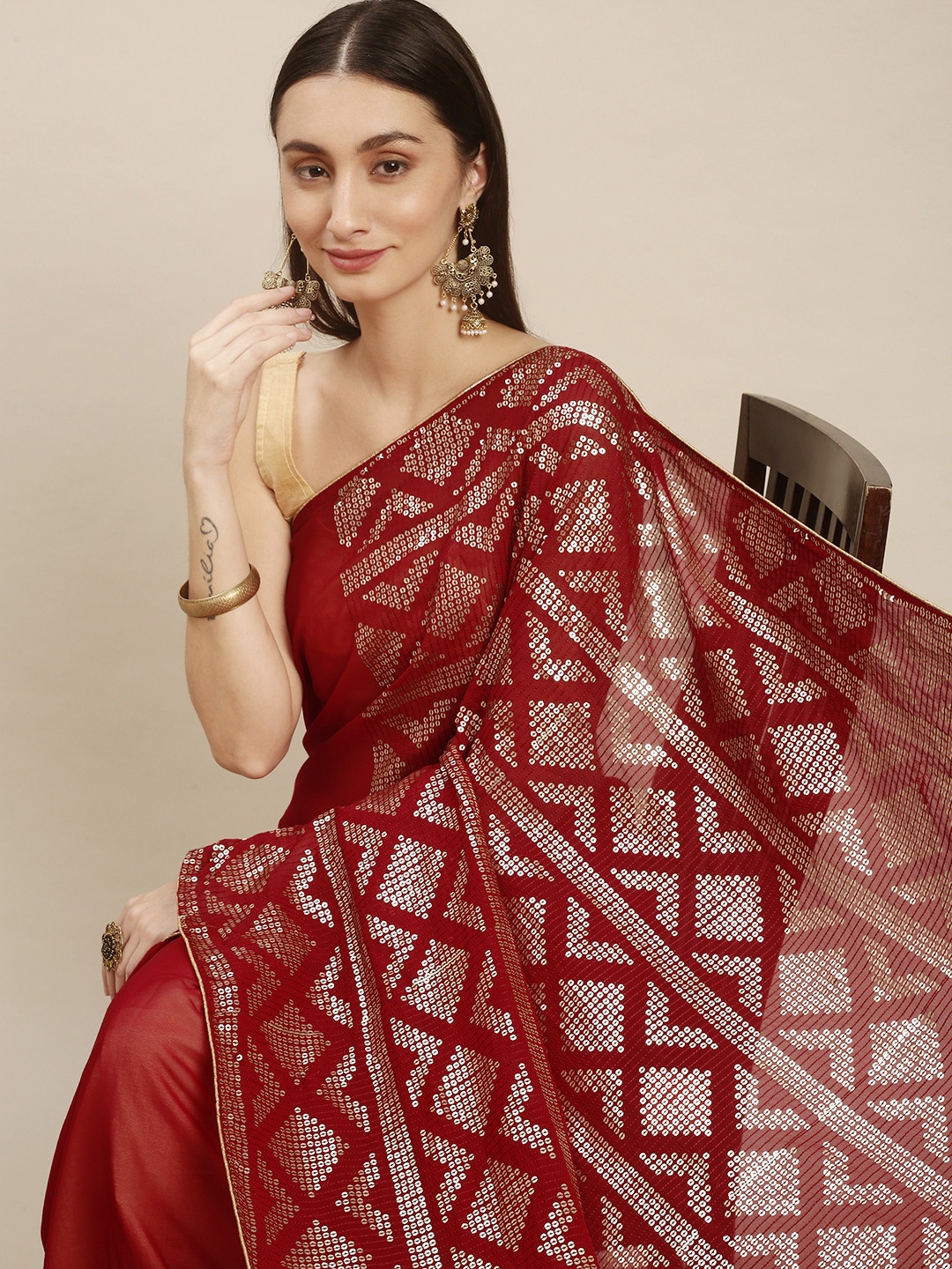 

nirja Fab Red Embroidered Sequinned Poly Geogette Saree