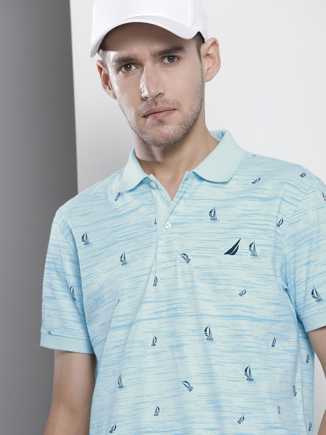 

Nautica Men Light Blue Printed Pure Cotton Polo T-shirt