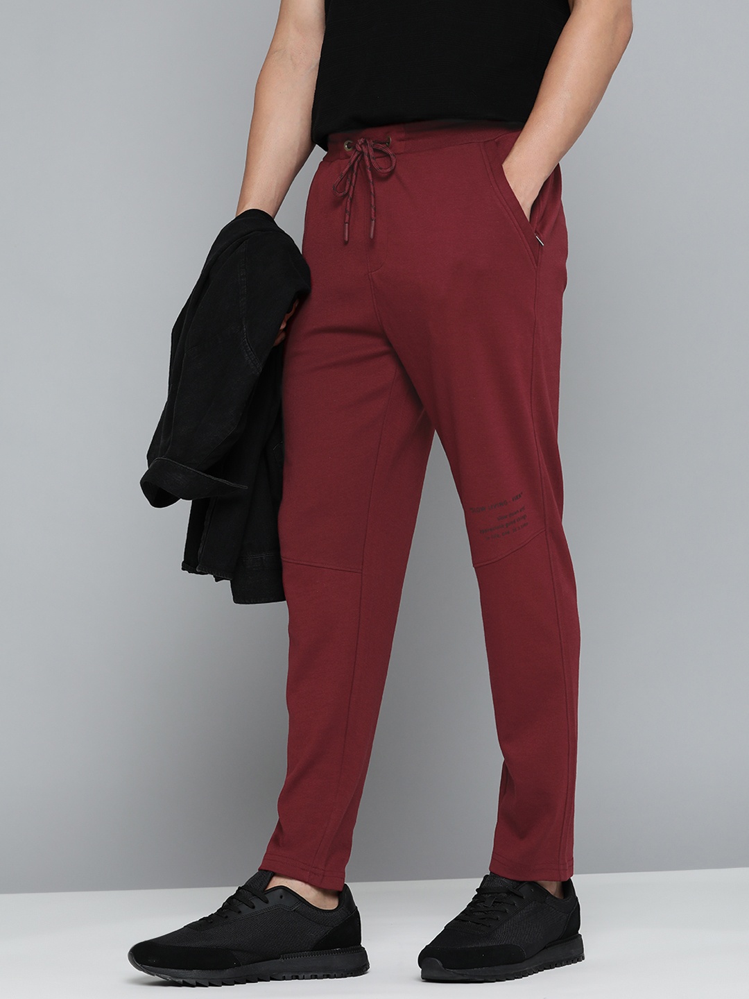 

ether Men Maroon Solid Track Pants
