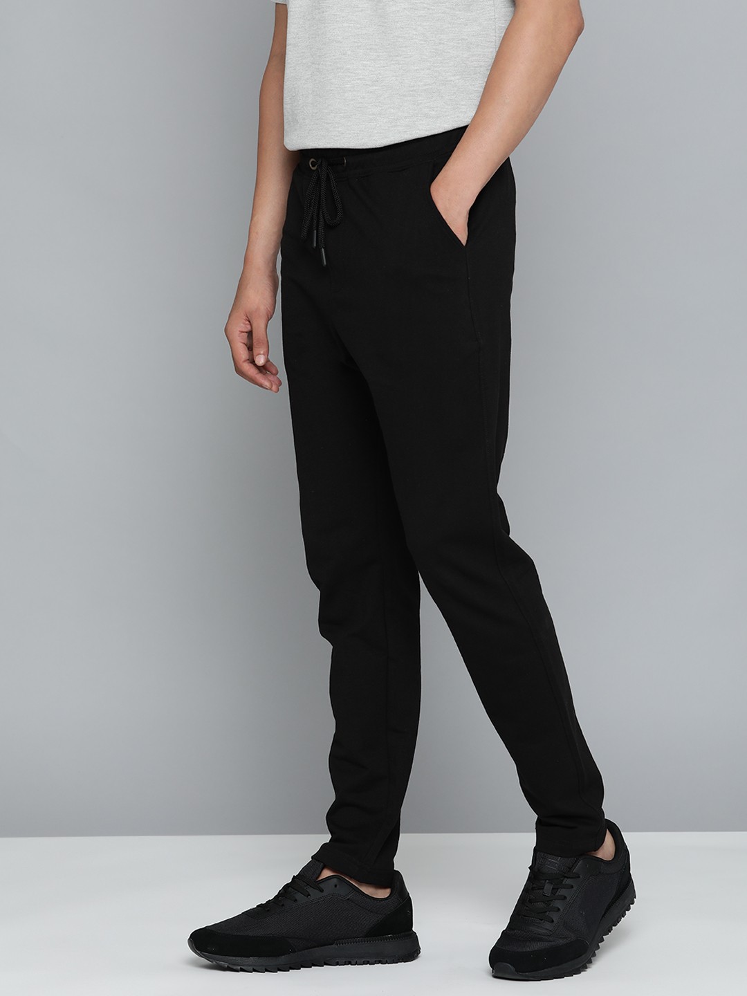 

ether Men Black Solid Track Pants