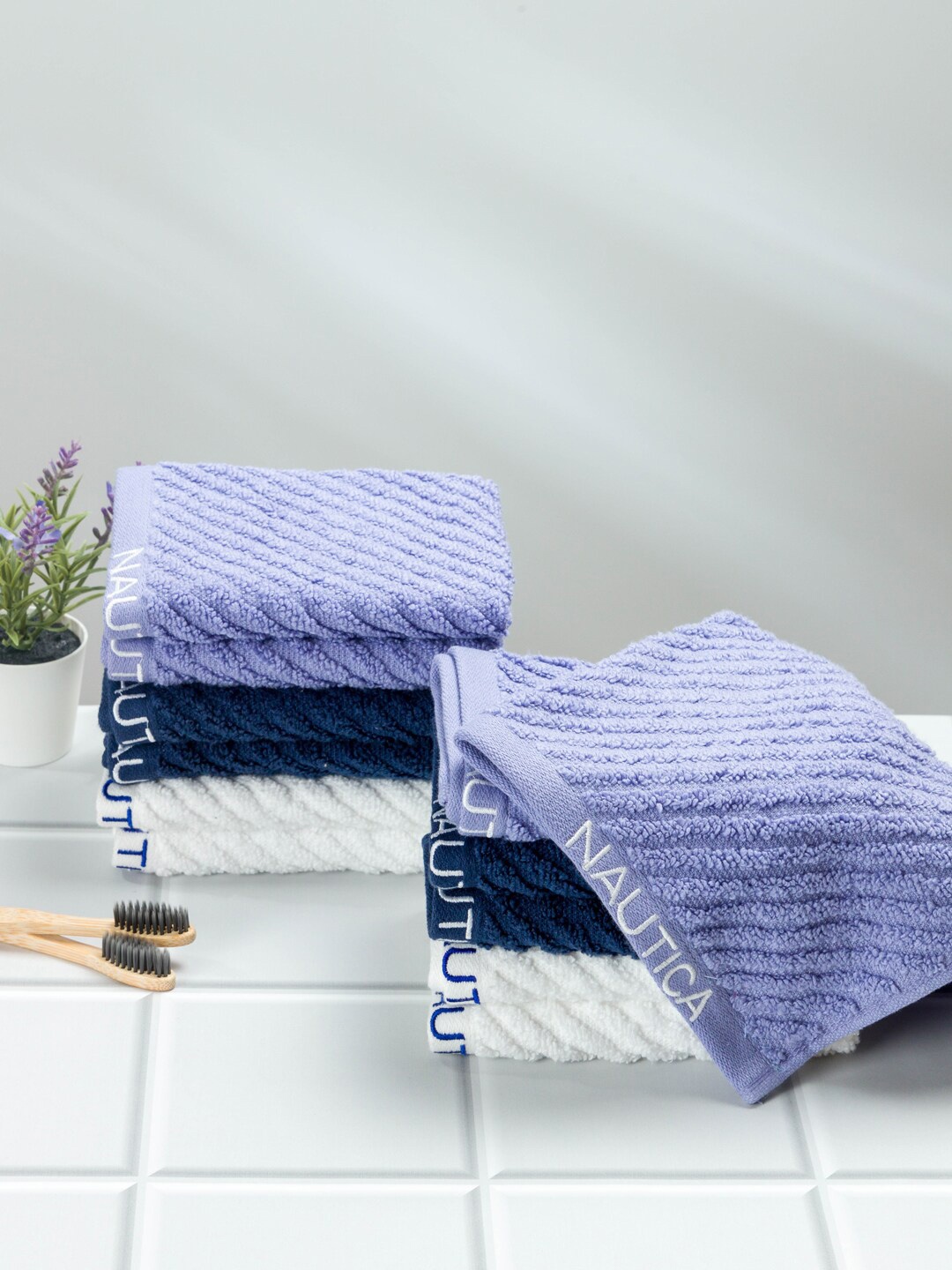 

Nautica Adults Set Of 12 Solid 600 GSM Pure Cotton Face Towels, Blue