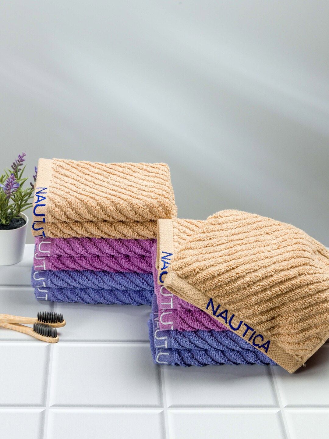 

Nautica Set Of 12 Solid 600 GSM Pure Cotton Face Towels, White