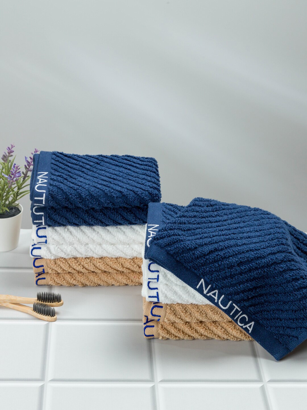 

Nautica Set Of 12 Solid 600 GSM Pure Cotton Face Towel, Multi