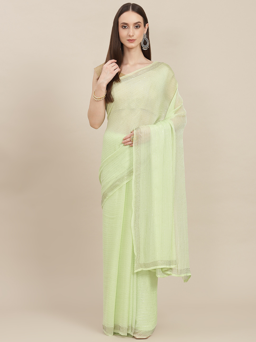 

ZARI Green Sequinned Pure Chiffon Saree
