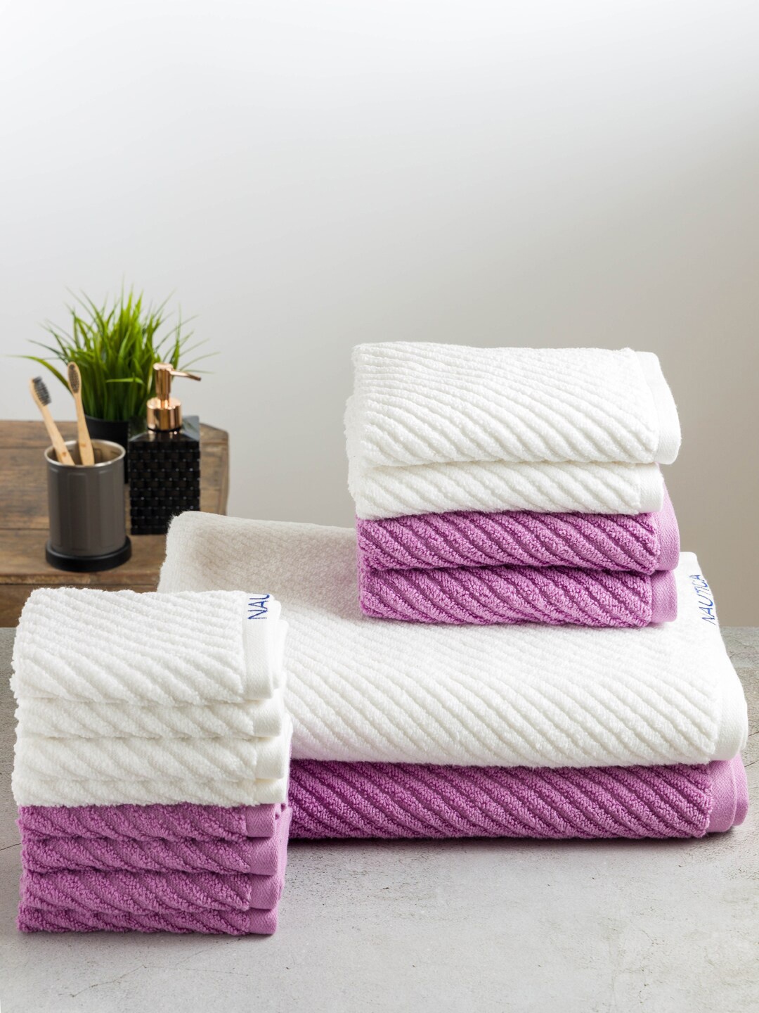 

Nautica Set Of 14 White & Purple Self Design Pure Cotton 600 GSM Towel Set