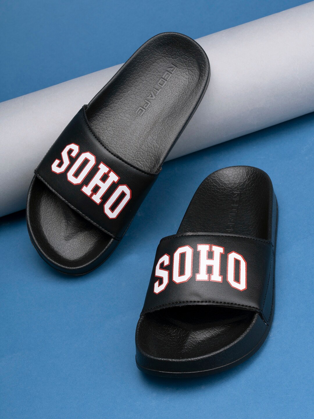 

Red Tape Women Black & White Printed Rubber Sliders