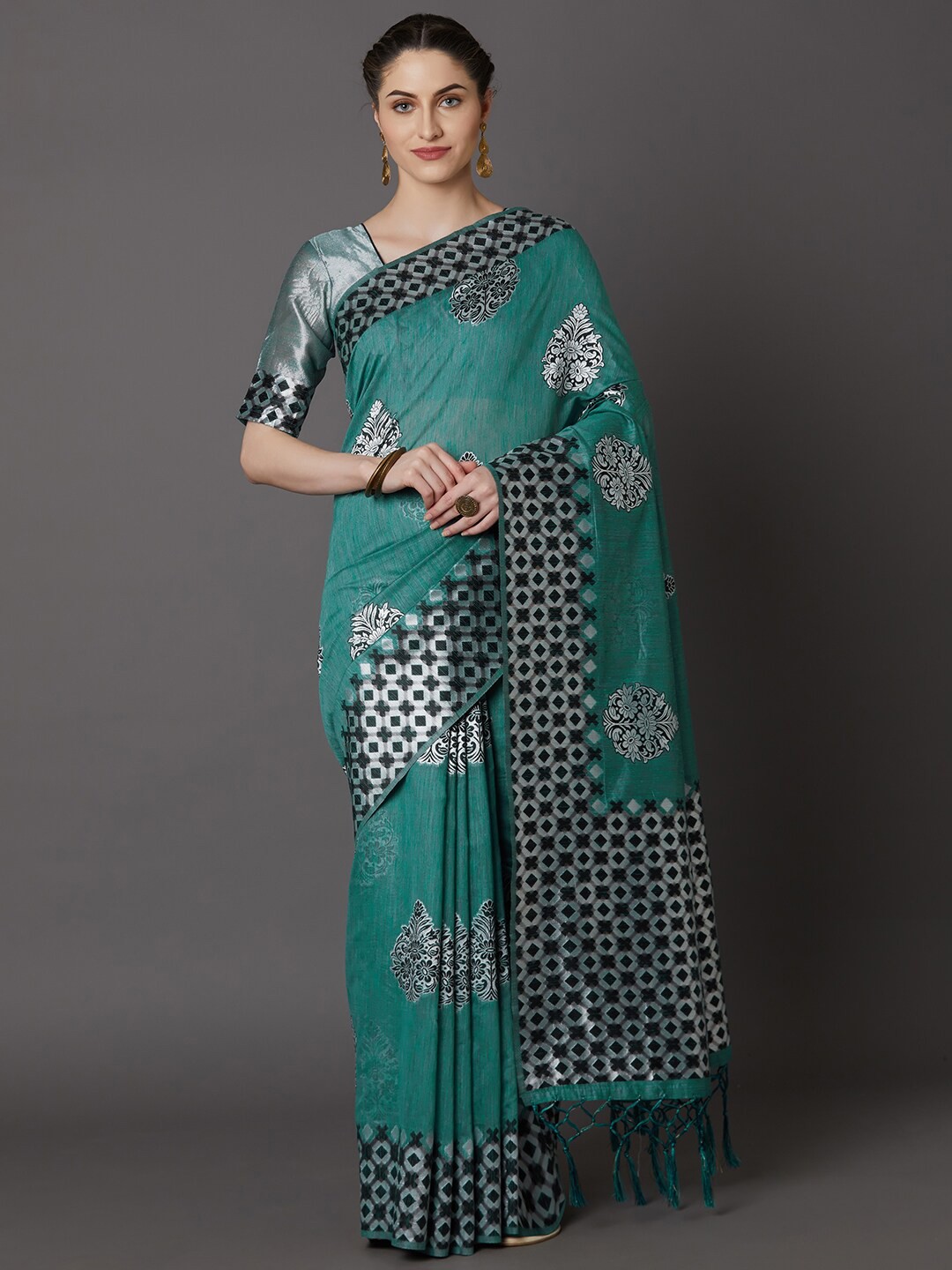 

Mitera Women Teal & Silver-Toned Ethnic Motifs Zari Silk Blend Saree