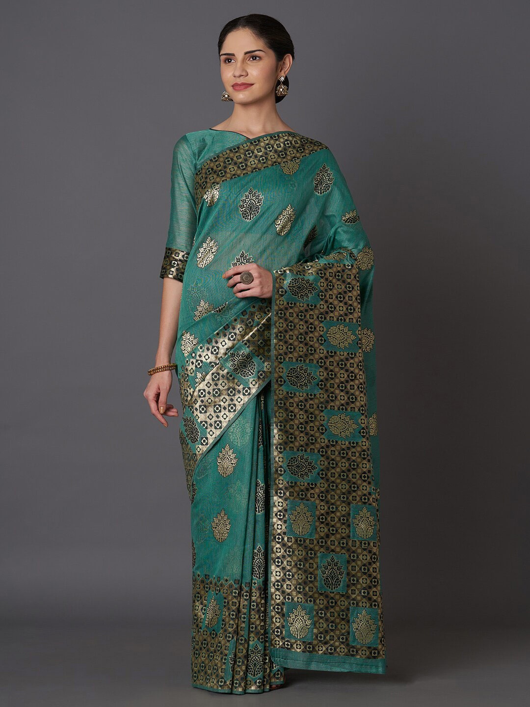 

Mitera Teal & Black Floral Zari Silk Blend Kasavu Saree