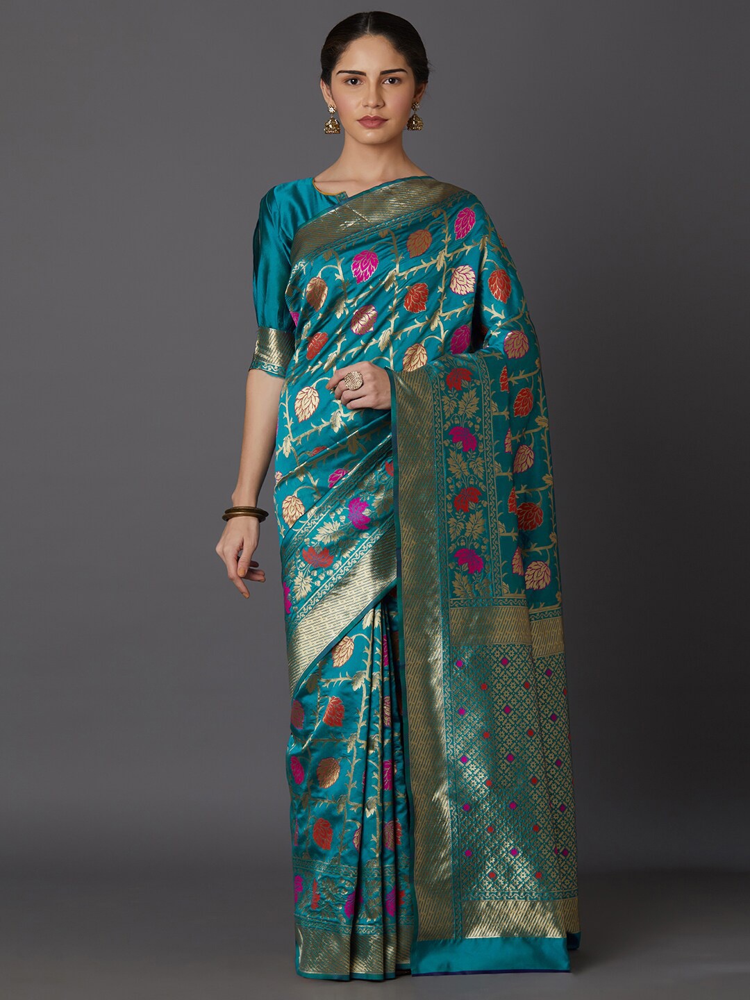 

Mitera Grey & Blue Ethnic Motifs Zari Silk Blend Saree